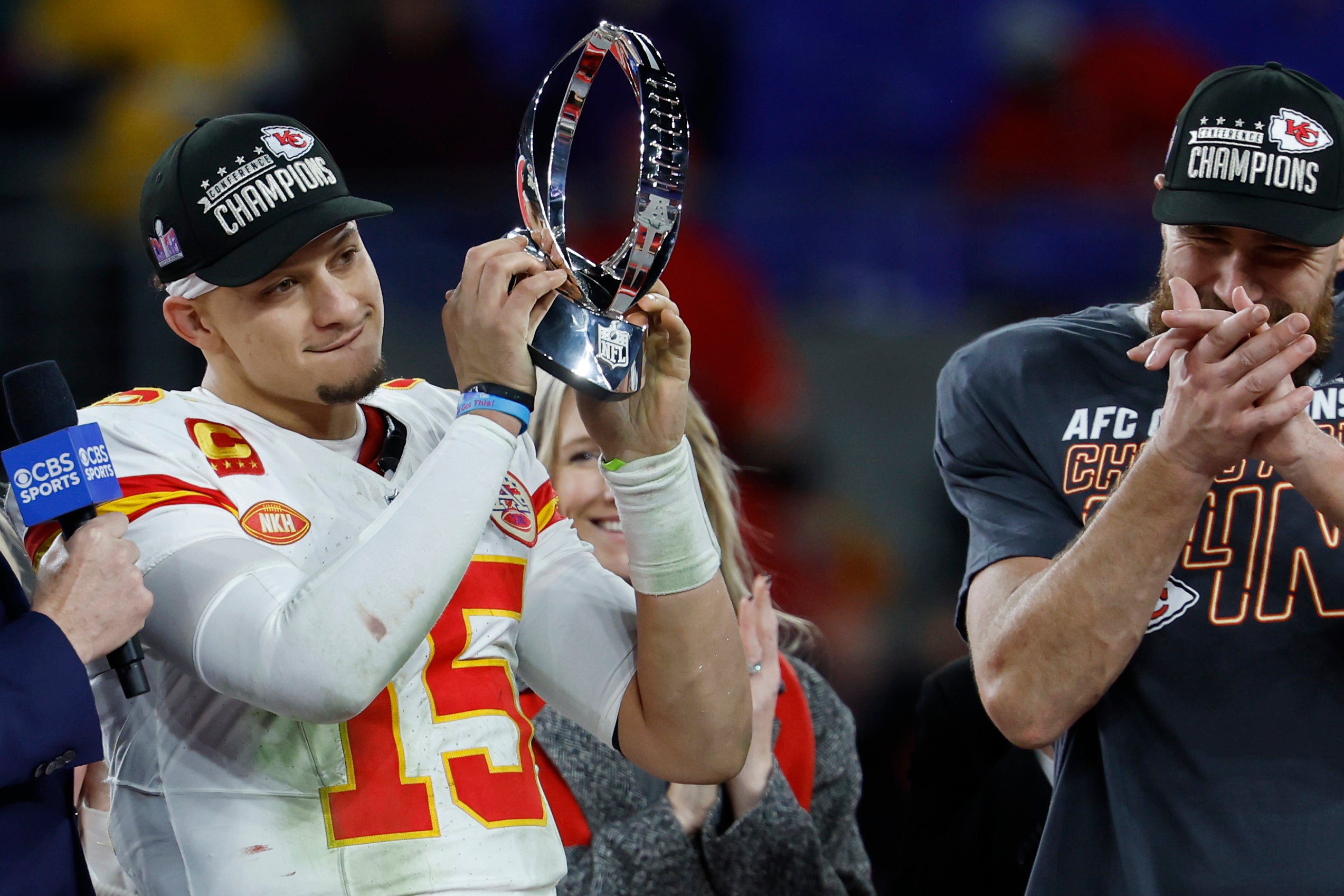 Kansas City Chiefs quarterback Patrick Mahomes celebrates with the Lamar Hunt trophy after the Chiefs' game against the Baltimore Ravens in the AFC Championship football game at M&T Bank Stadium