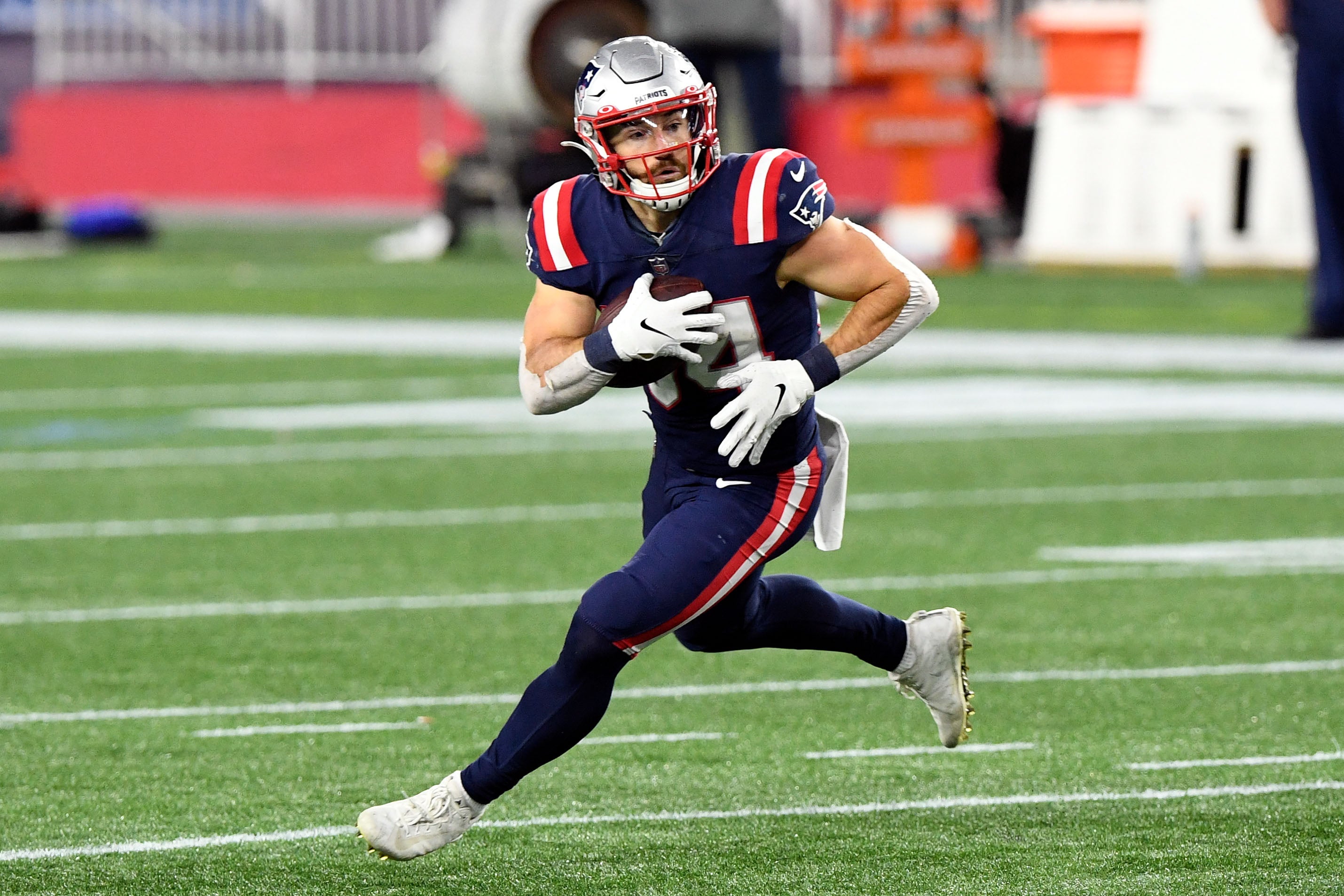 New England Patriots running back Rex Burkhead runs with the ball during the second half against the San Francisco 49ers at Gillette Stadium