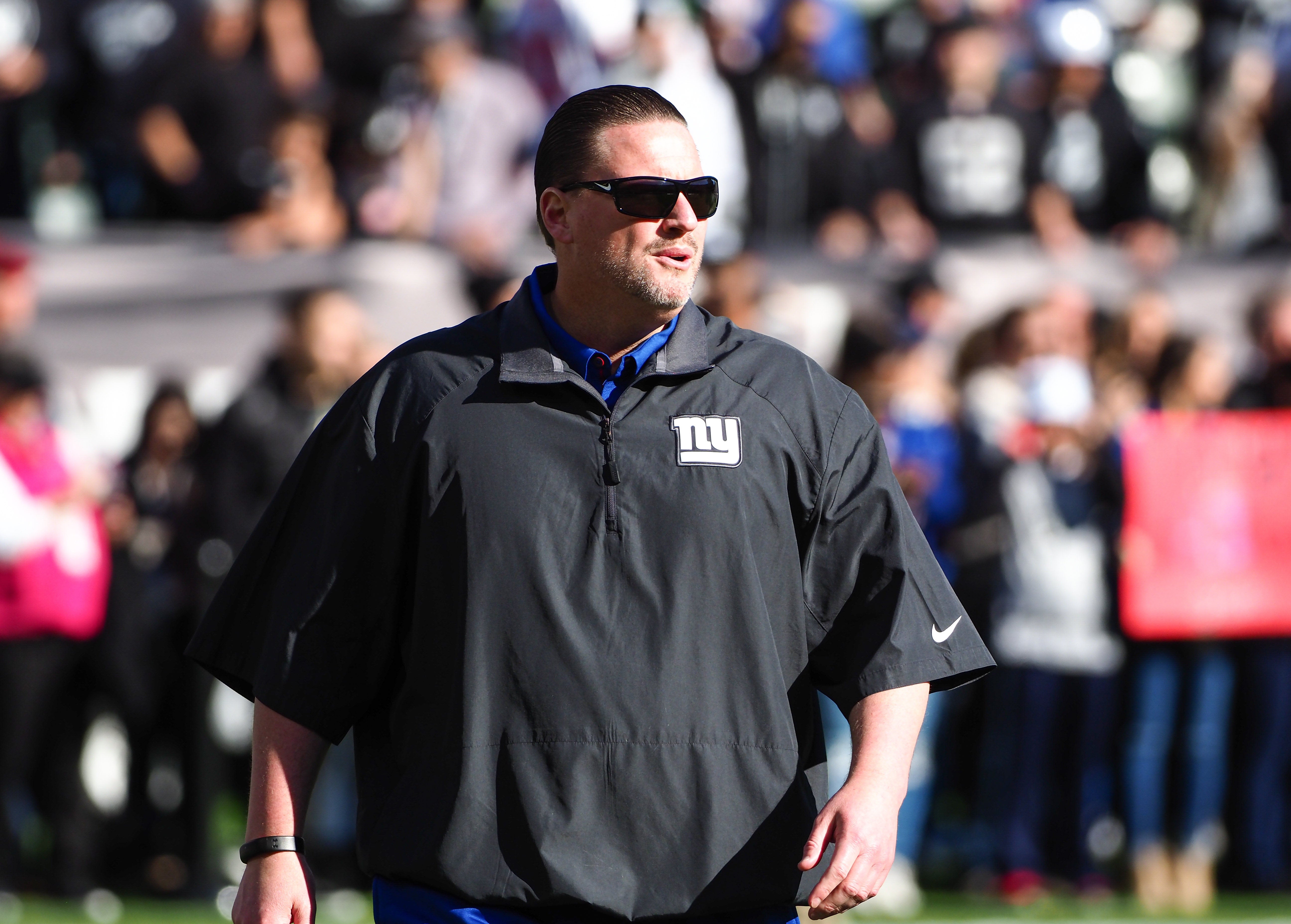 New York Giants head coach Ben McAdoo on the field before the game against the Oakland Raiders at Oakland Coliseum