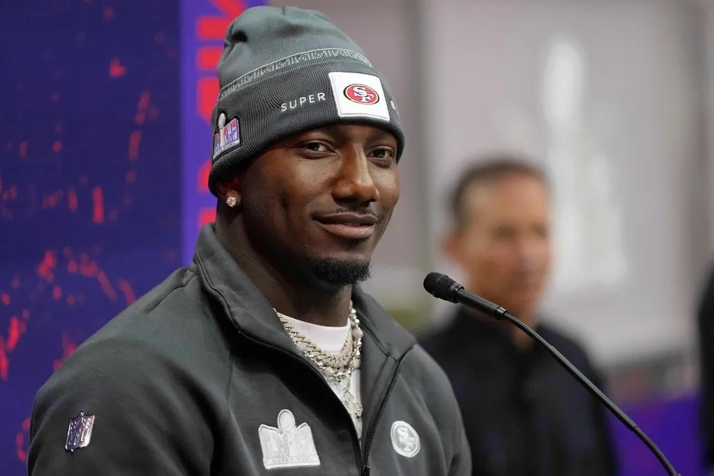 San Francisco 49ers wide receiver Deebo Samuel (19) talks to the media during Super Bowl LVIII Opening Night at Allegiant Stadium.