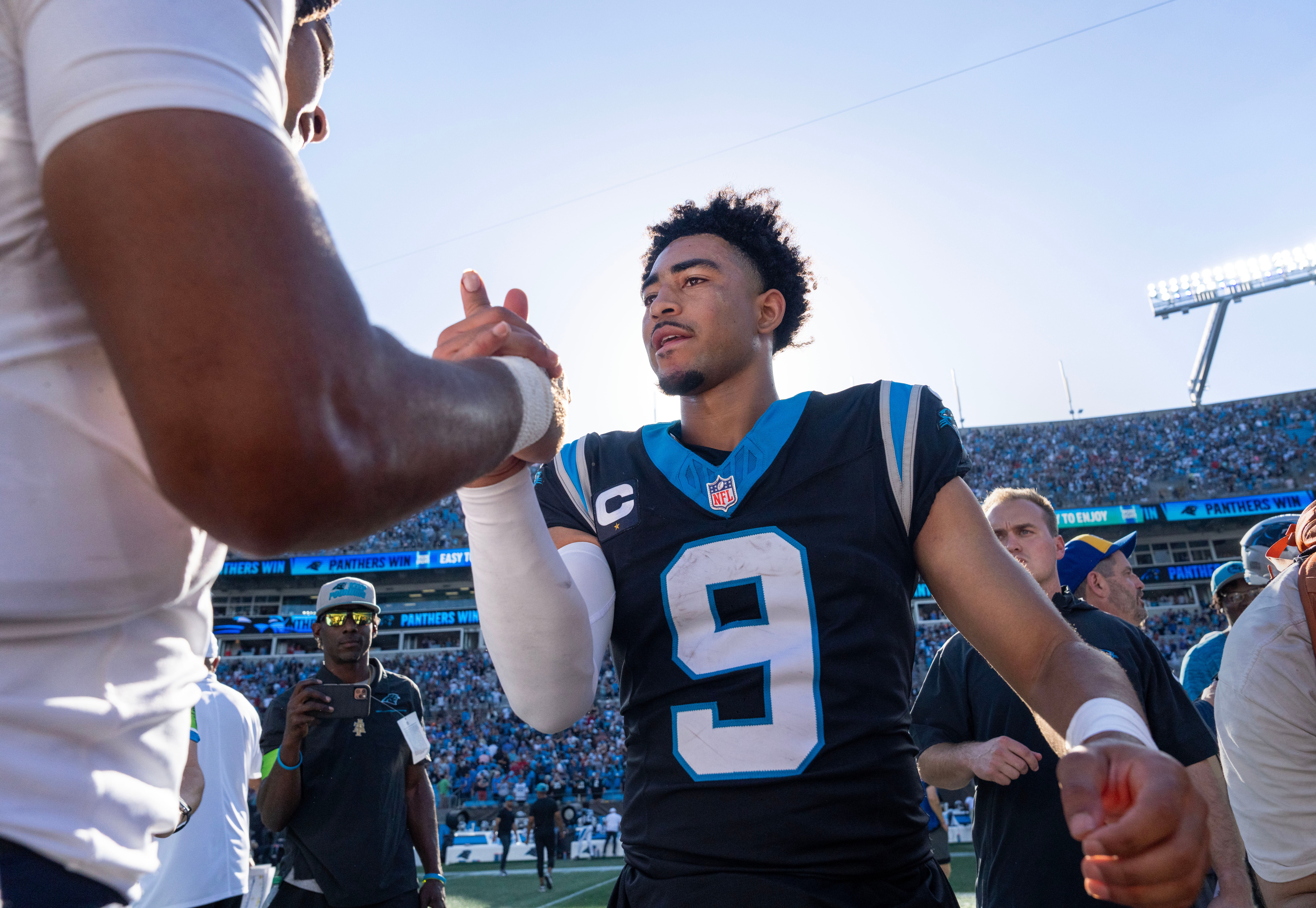 Oct 29, 2023; Charlotte, North Carolina, USA; Houston Texans quarterback C.J. Stroud (7) and Carolina Panthers quarterback Bryce Young (9) after the game at Bank of America Stadium. Mandatory Credit: Bob Donnan-USA TODAY Sports