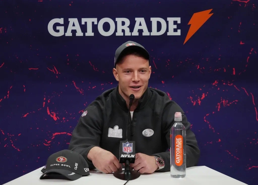 San Francisco 49ers running back Christian McCaffrey (23) is interviewed during Super Bowl LVIII Opening Night at Allegiant Stadium.