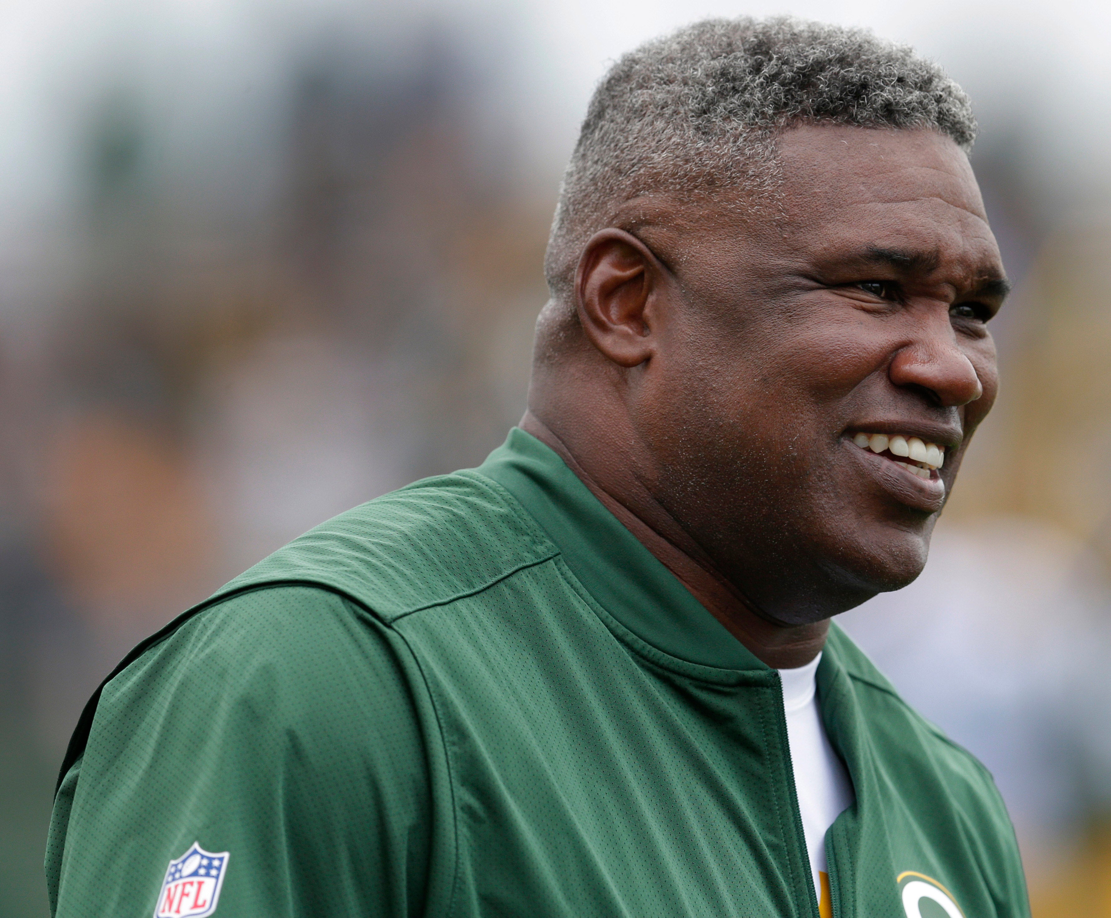 Green Bay Packers senior personnel executive Alonzo Highsmith looks on during the training camp across from Lambeau Field.