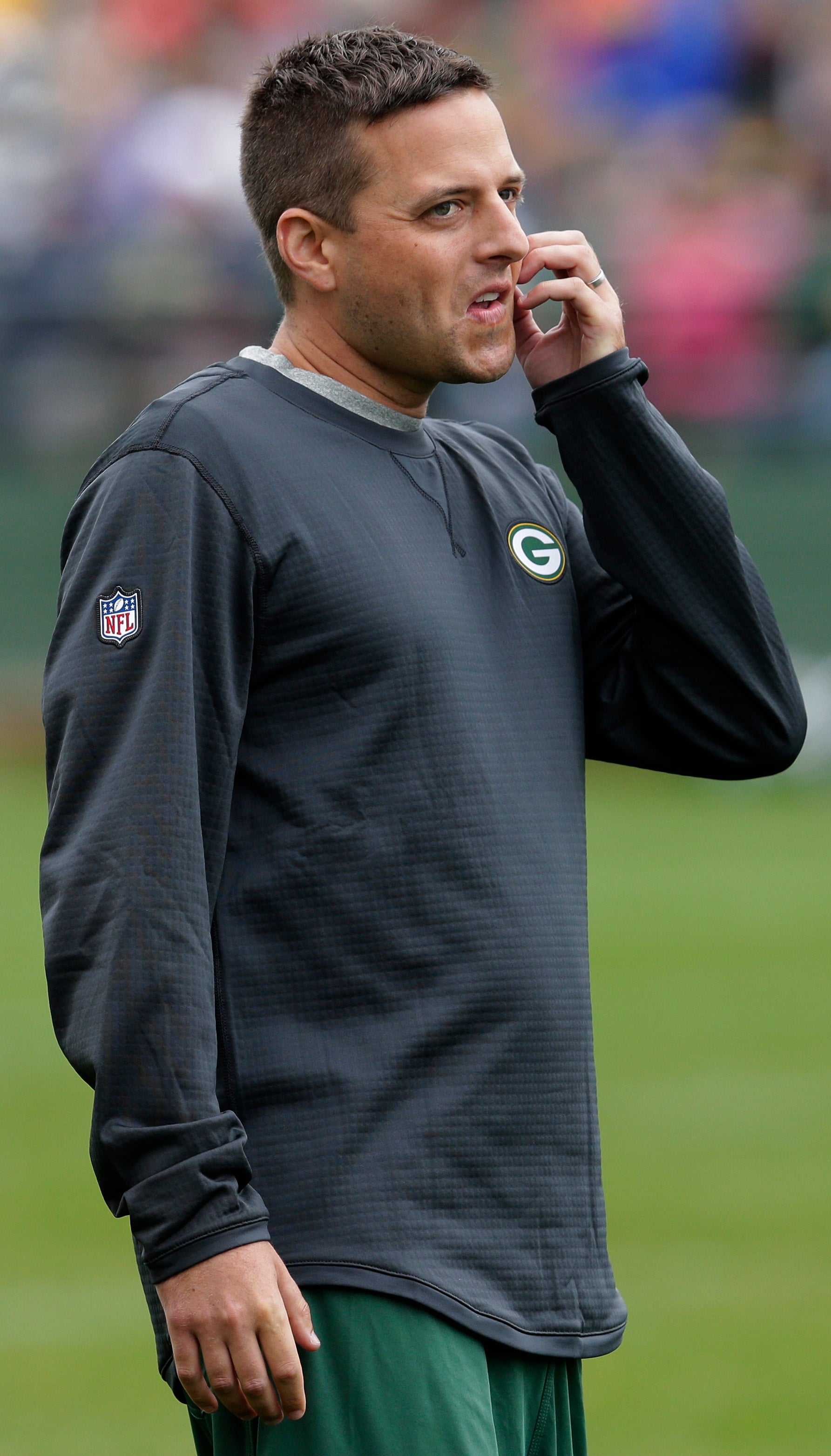 Green Bay Packers director of football operations Eliot Wolf looks on during the training camp across from Lambeau Field.