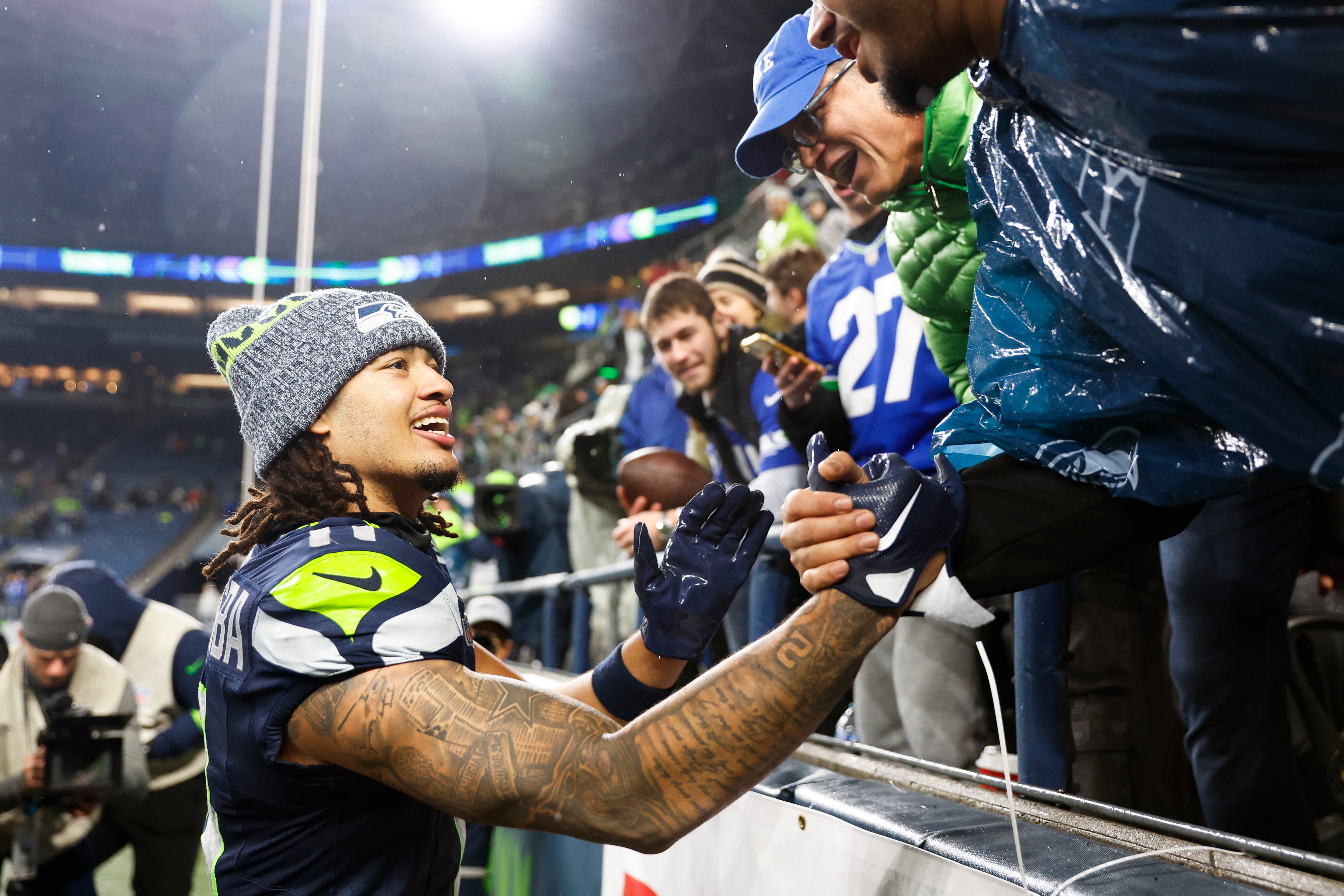 Dec 18, 2023; Seattle, Washington, USA; Seattle Seahawks wide receiver Jaxon Smith-Njigba (11) celebrates with fans following a 20-17 victory against the Philadelphia Eagles at Lumen Field.