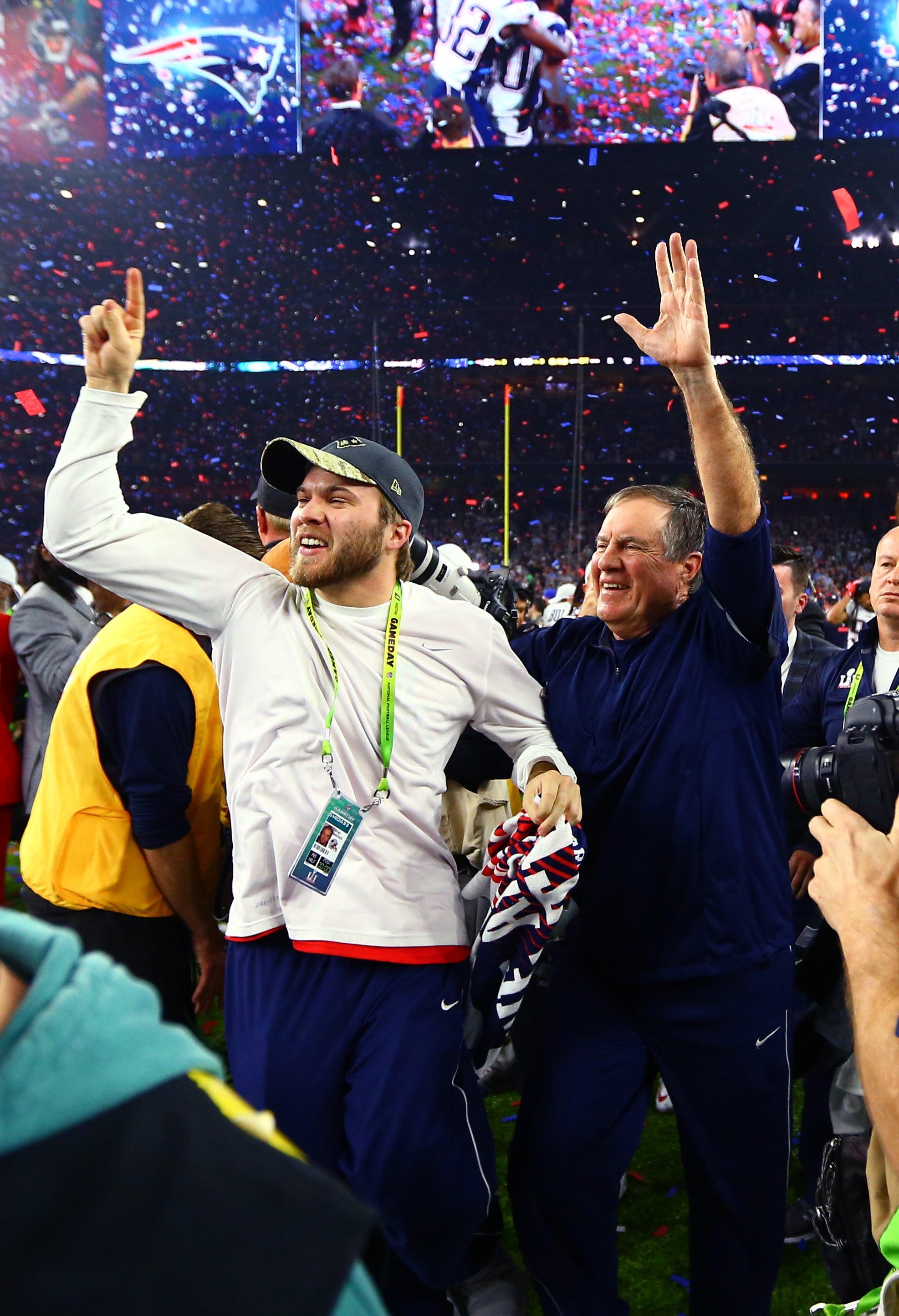 New England Patriots head coach Bill Belichick celebrates with son Brian Belichick after defeating the Atlanta Falcons during Super Bowl LI at NRG Stadium.