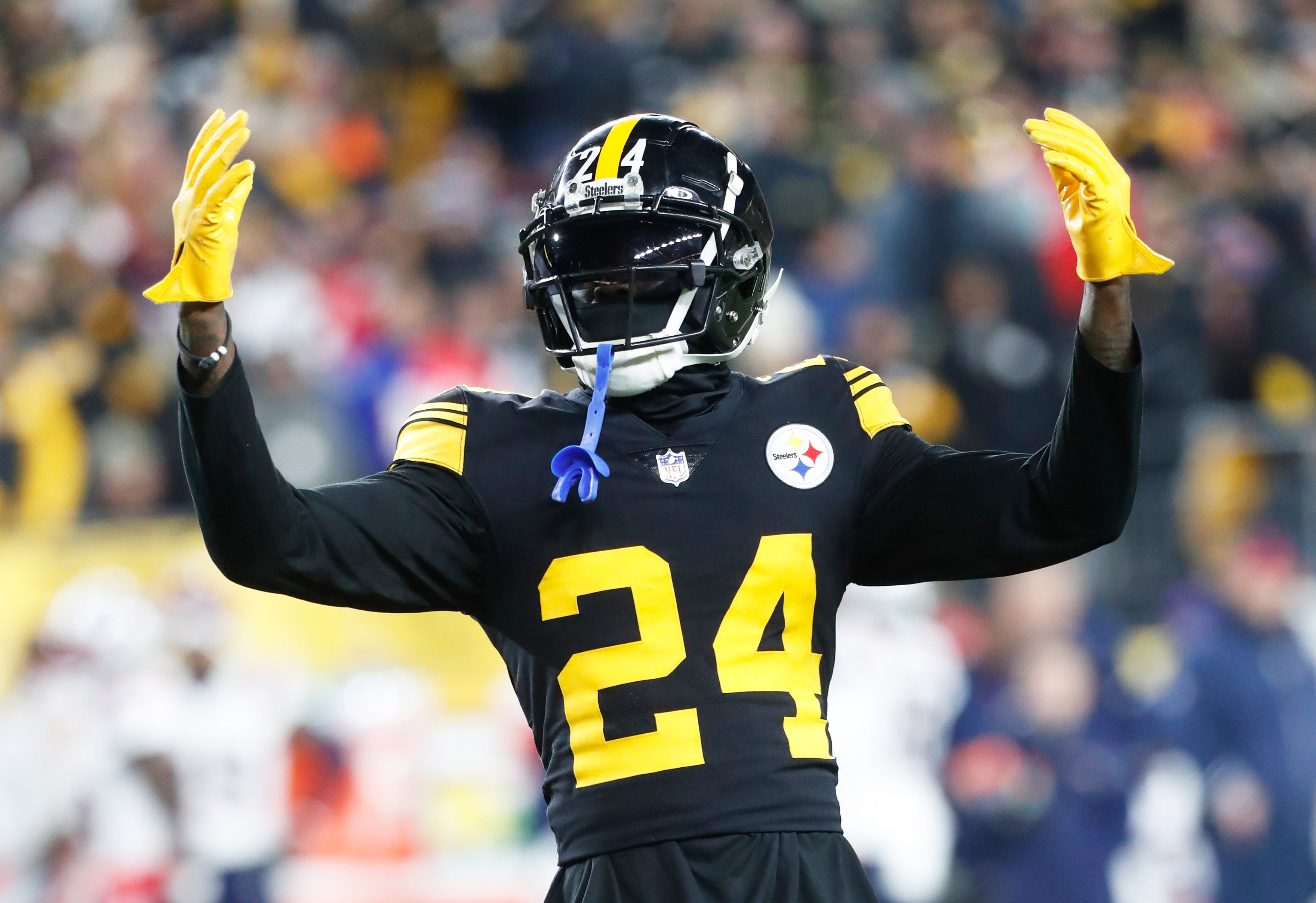 Dec 7, 2023; Pittsburgh, Pennsylvania, USA; Pittsburgh Steelers cornerback Joey Porter Jr. (24) reacts to the crowd against the New England Patriots during the fourth quarter at Acrisure Stadium. Mandatory Credit: Charles LeClaire-USA TODAY Sports