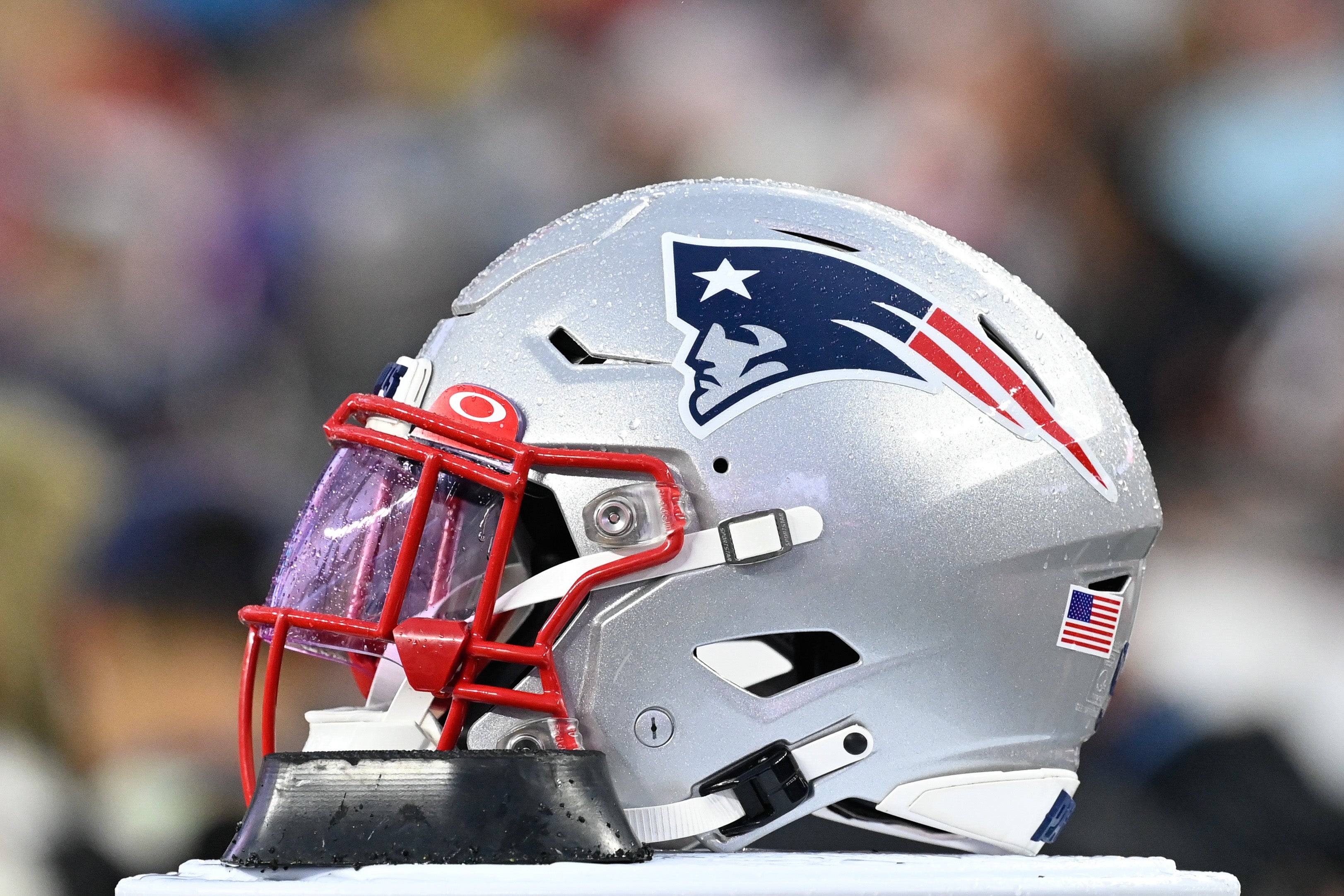 A New England Patriots helmet sits on the sideline during the first half against the Houston Texans at Gillette Stadium