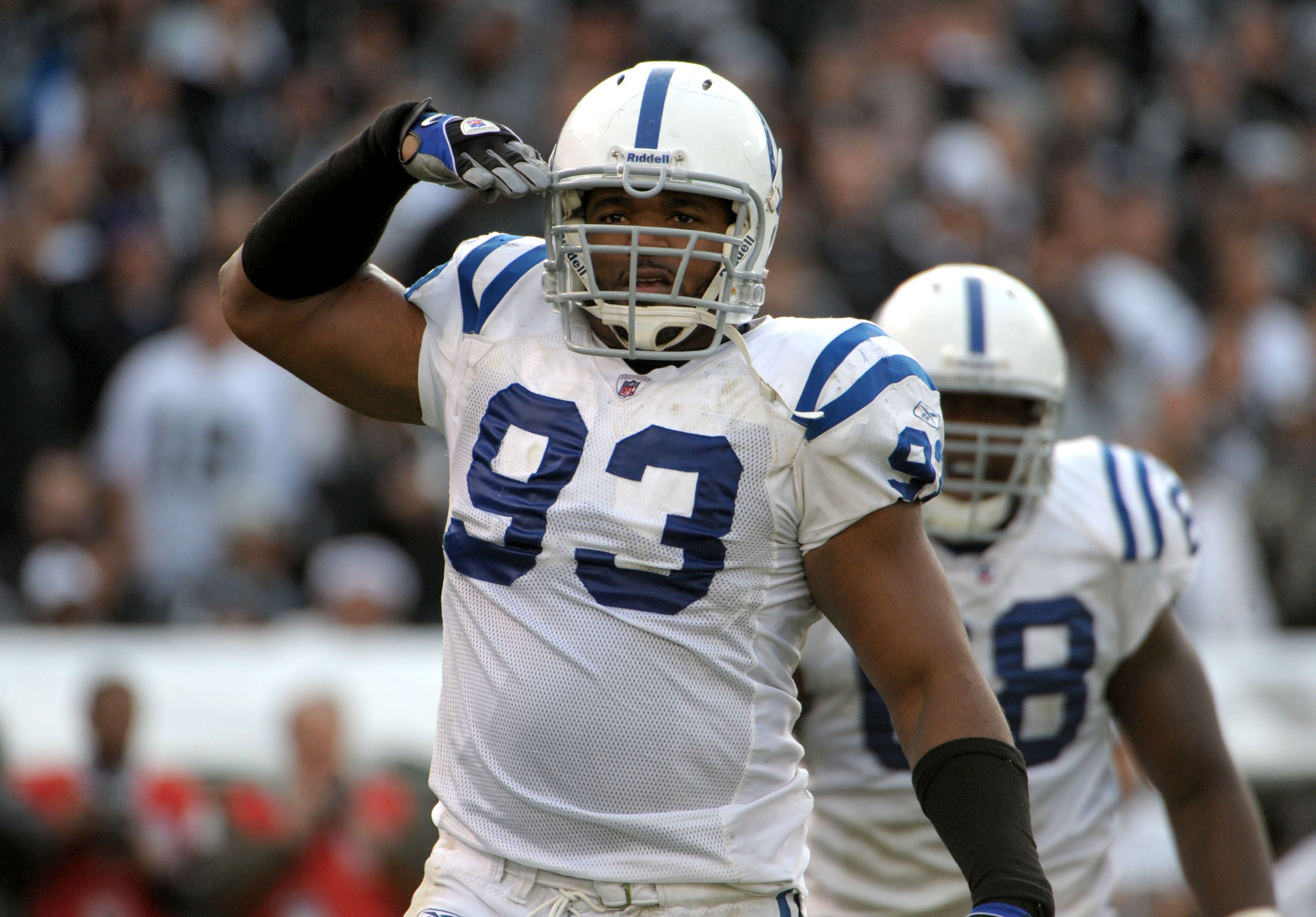 Dec 26, 2010; Oakland, CA, USA; Indianapolis Colts defensive end Dwight Freeney (93) reacts after a tackle against the Oakland Raiders at the Oakland-Alameda County Coliseum. The Colts defeated the Raiders 31-26.