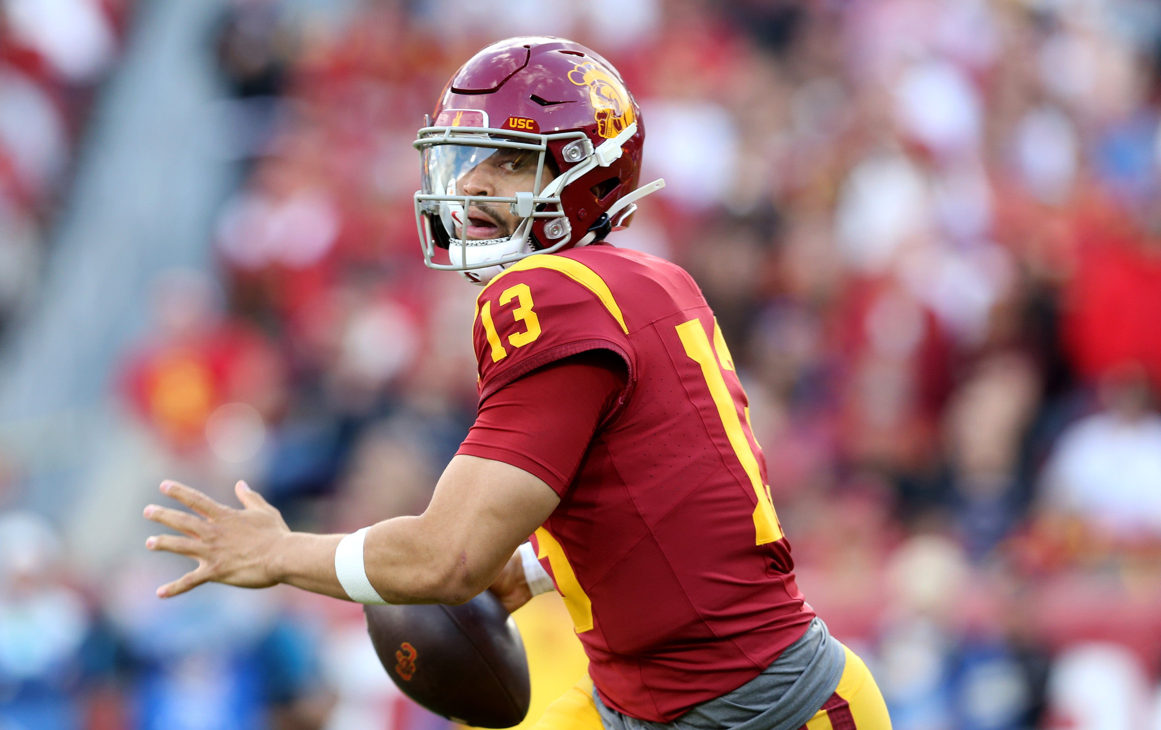 Nov 18, 2023; Los Angeles, California, USA; USC Trojans quarterback Caleb Williams (13) throws during the second quarter against the UCLA Bruins at United Airlines Field at Los Angeles Memorial Coliseum.