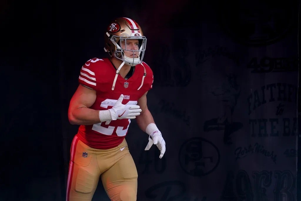 San Francisco 49ers running back Christian McCaffrey (23) is introduced before the start of the game against the Seattle Seahawks at Levi's Stadium.