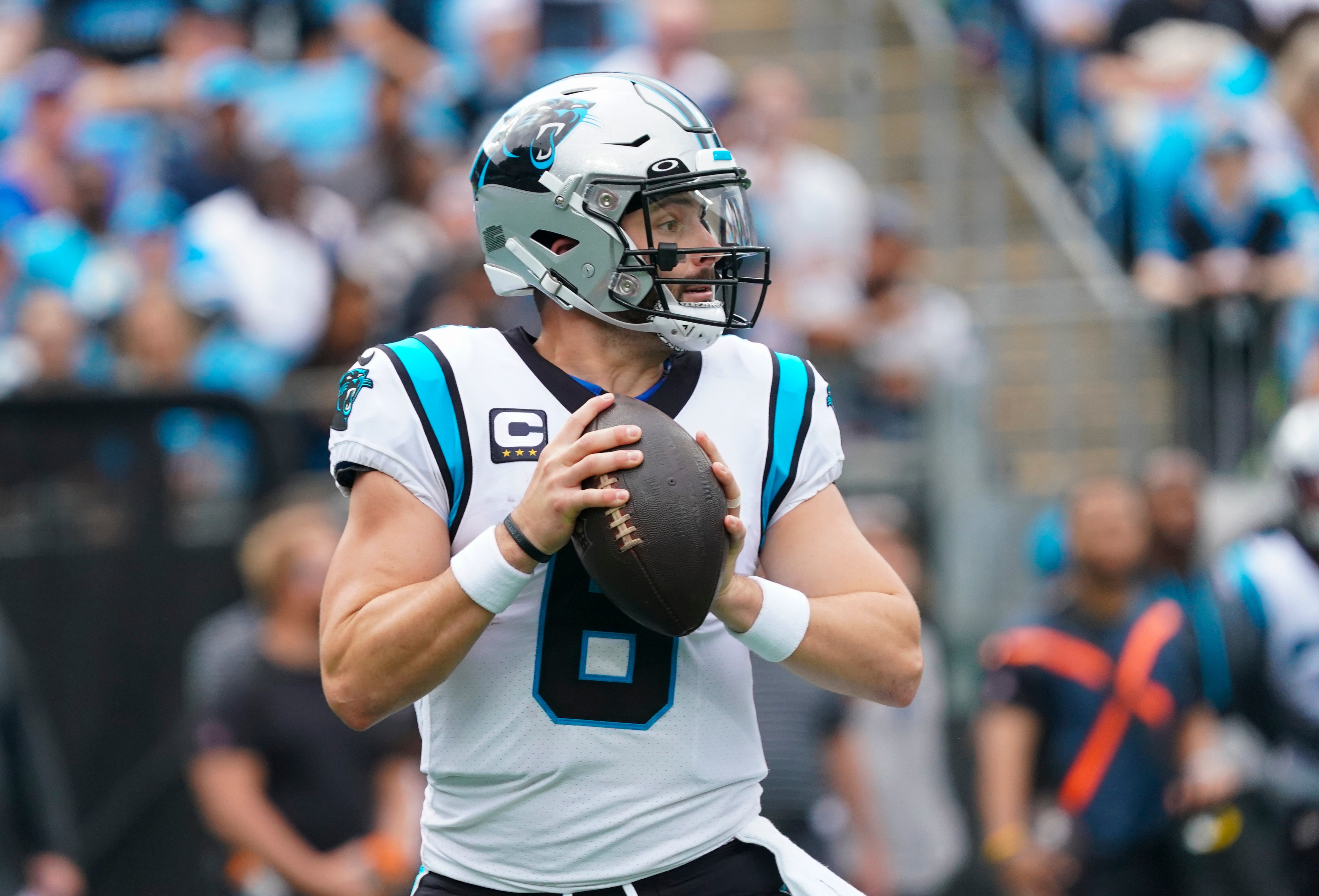 Sep 25, 2022; Charlotte, North Carolina, USA; Carolina Panthers quarterback Baker Mayfield (6) goes back to throw the ball against the New Orleans Saints during the second quarter at Bank of America Stadium. Mandatory Credit: James Guillory-USA TODAY Sports