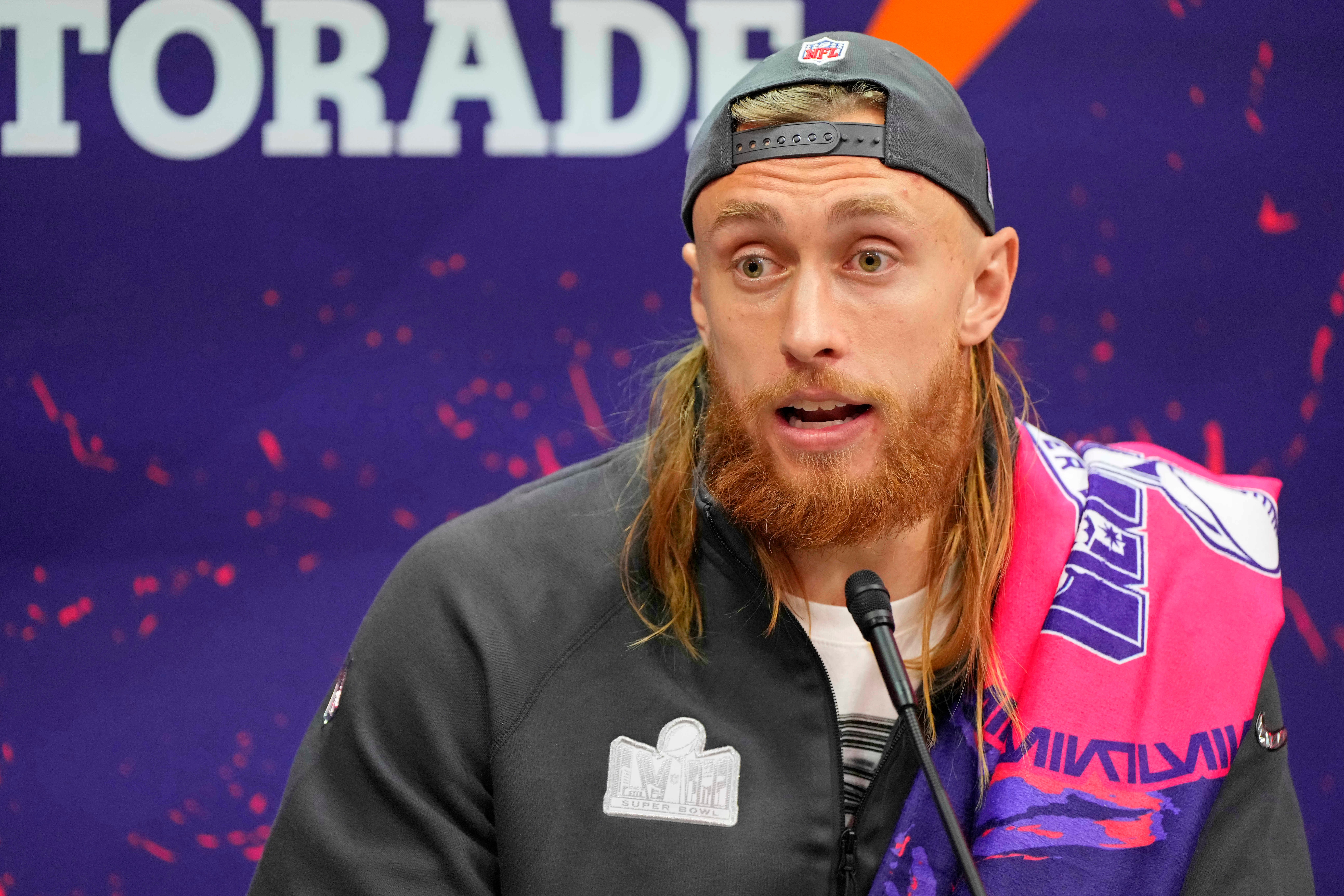 Feb 5, 2024; Las Vegas, NV, USA; San Francisco 49ers tight end George Kittle (85) talks to the media during Super Bowl LVIII Opening Night at Allegiant Stadium.