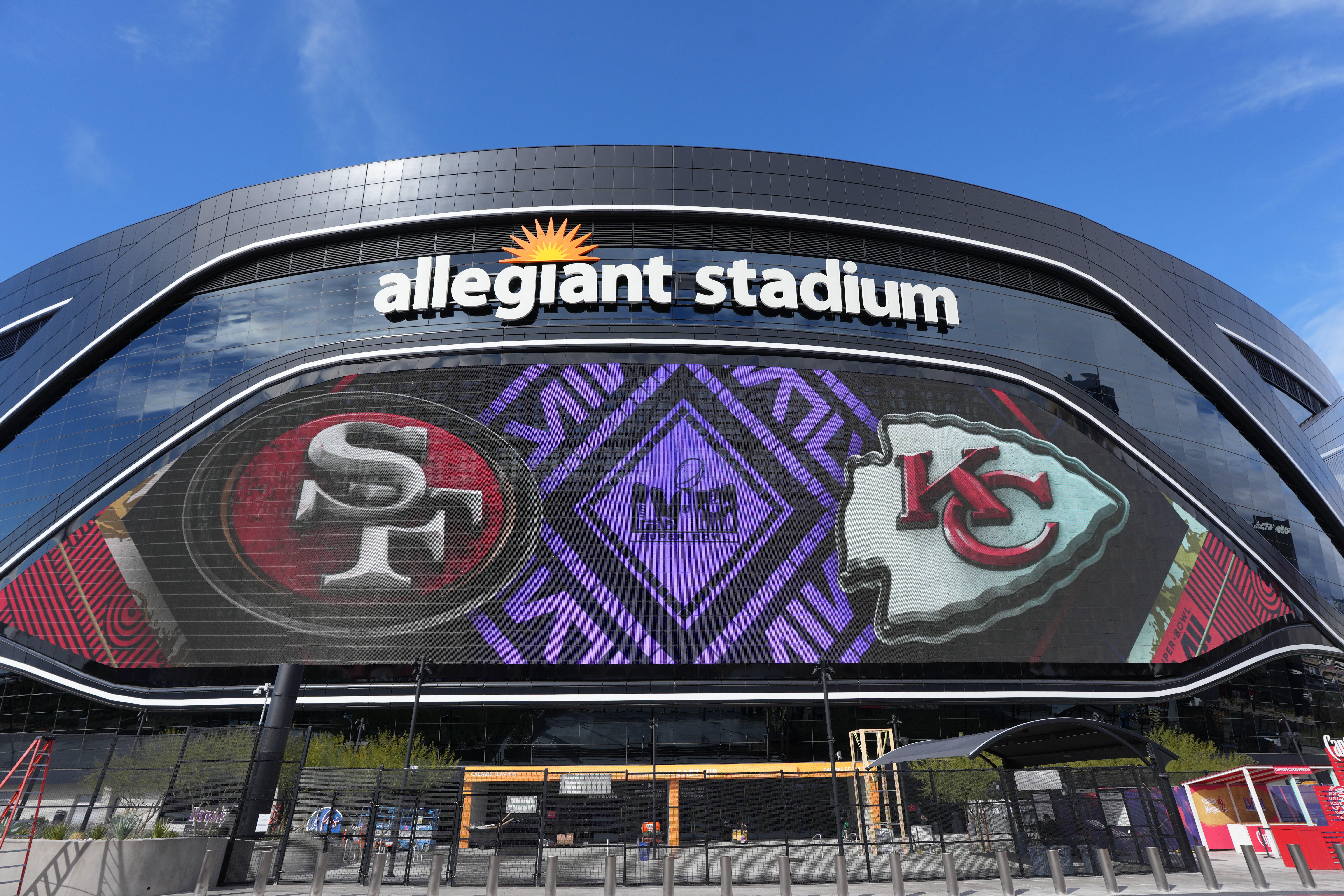 Feb 7, 2024; Las Vegas, NV, USA; A general overall view of San Francisco 49ers and Kansas City Chiefs logos on the Allegiant Stadium facade.