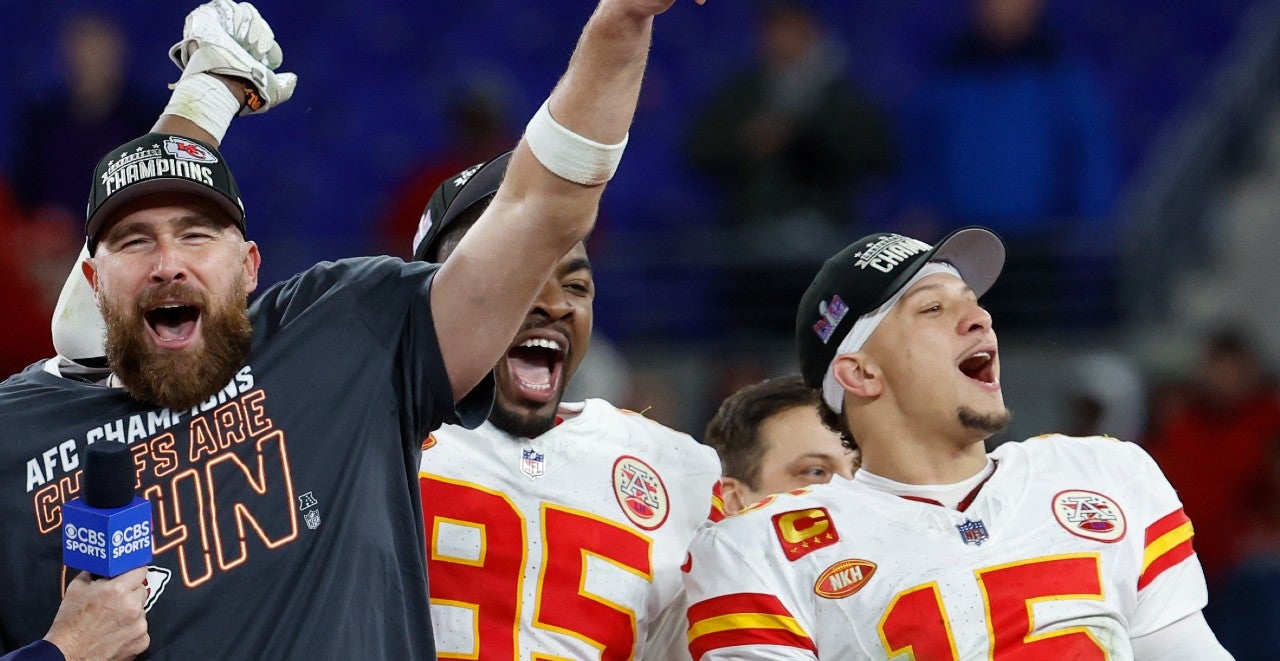 Jan 28, 2024; Baltimore, Maryland, USA; Kansas City Chiefs tight end Travis Kelce (M) celebrates with the Lamar Hunt trophy next to Chiefs defensive tackle Chris Jones (95) and Chiefs quarterback Patrick Mahomes (15) while speaking with CBS broadcaster Jim Nantz (L) after the Chiefs' game against the Baltimore Ravens in the AFC Championship football game at M&T Bank Stadium. Mandatory Credit: Geoff Burke-USA TODAY Sports