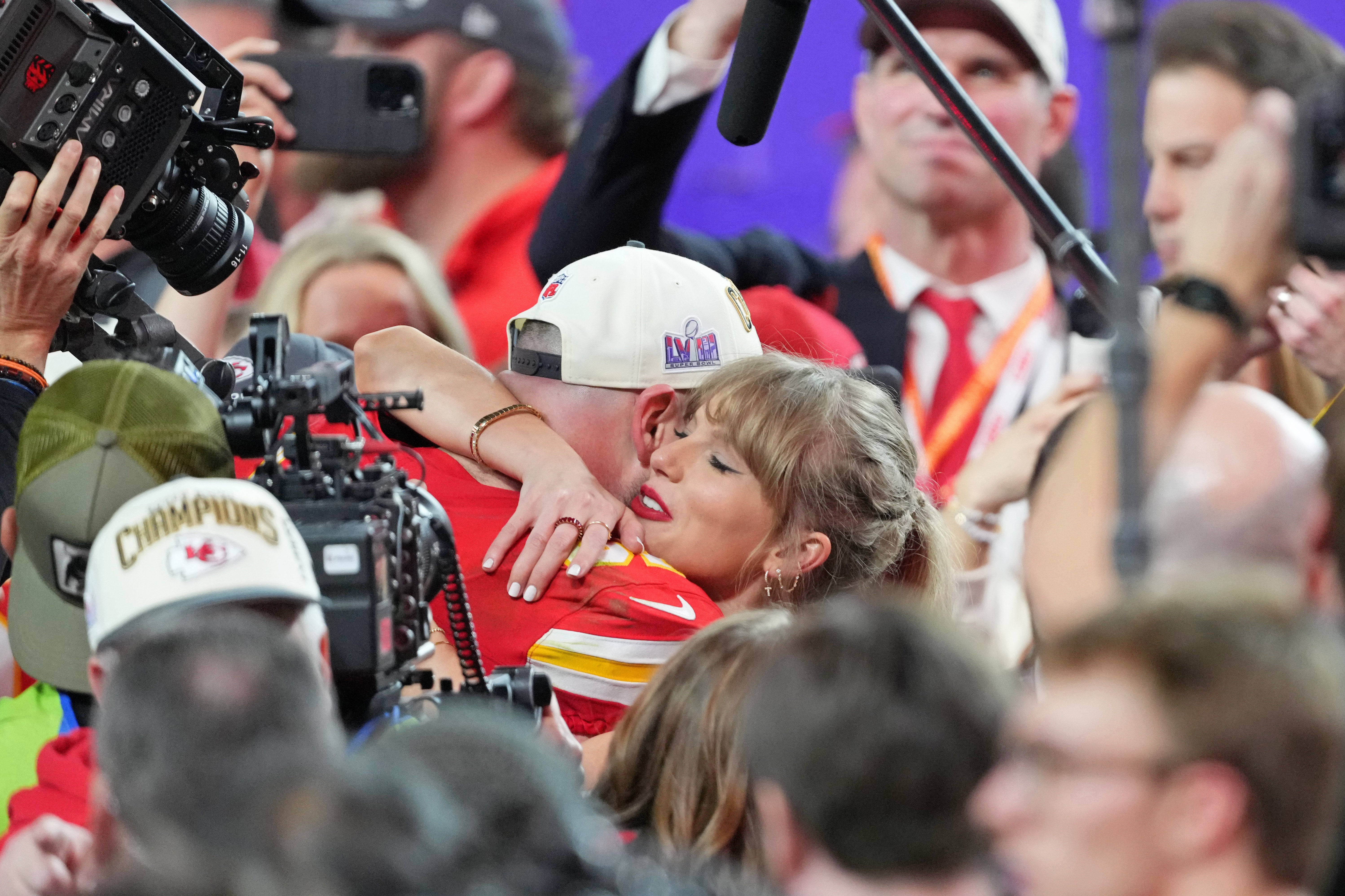 Kansas City Chiefs tight end Travis Kelce hugs recording artist Taylor Swift after winning Super Bowl LVIII against the San Francisco 49ers at Allegiant Stadium.