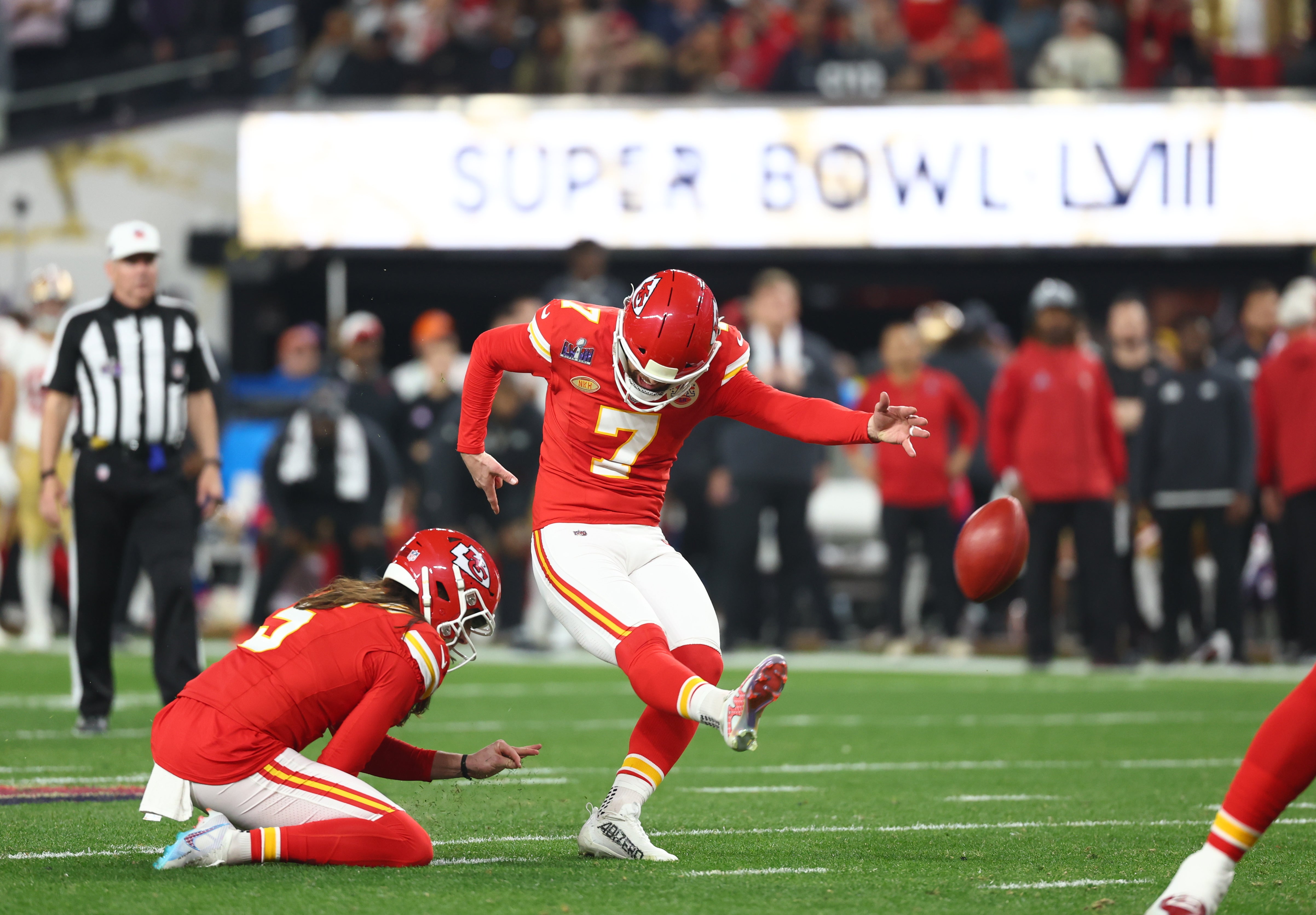 Kansas City Chiefs place kicker Harrison Butker (7) kicks a field goal against the San Francisco 49ers in the fourth quarter in Super Bowl LVIII