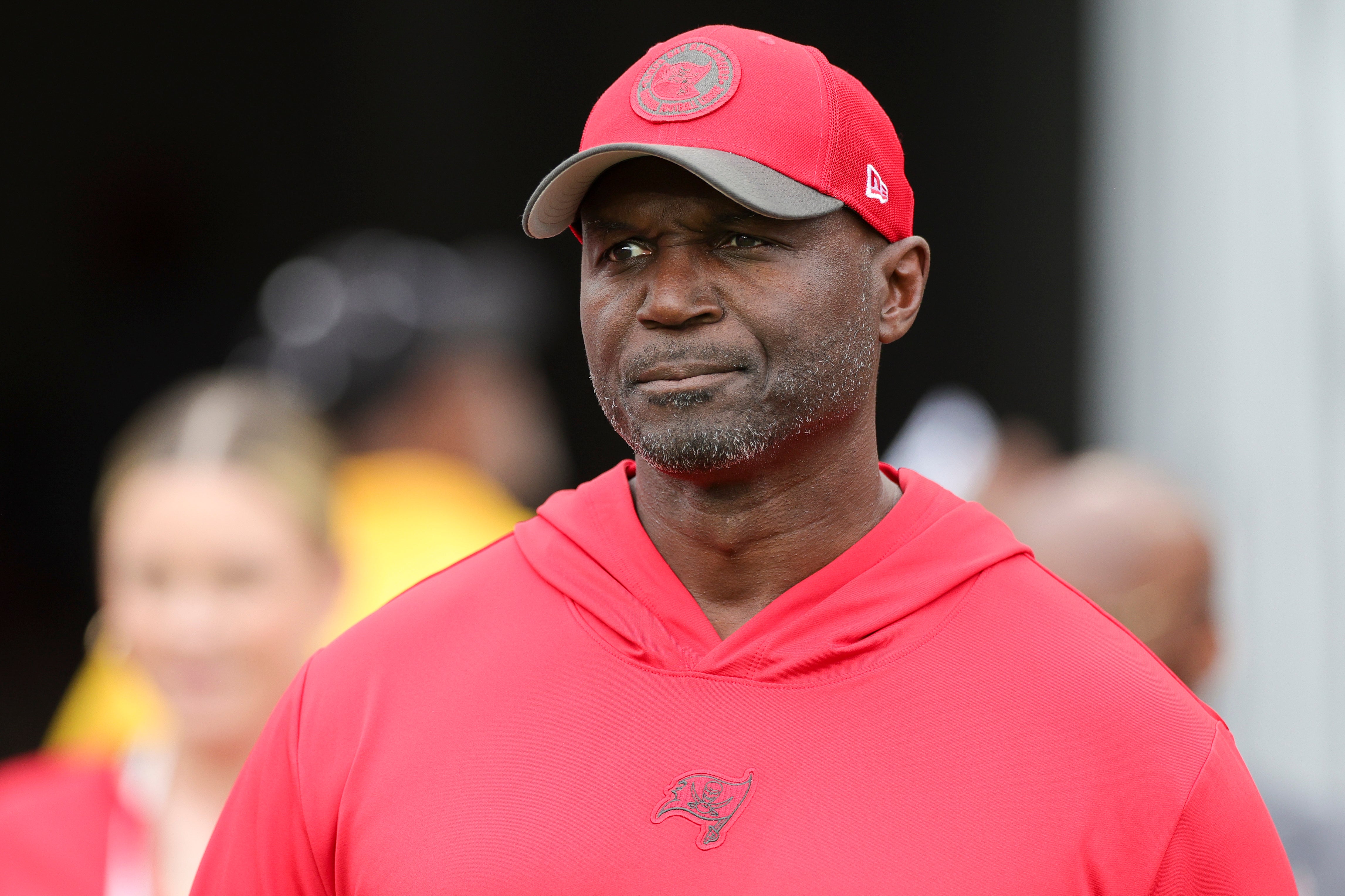 Dec 3, 2023; Tampa, Florida, USA; Tampa Bay Buccaneers head coach Todd Bowles takes the field for warms ups before a game against the Carolina Panthers at Raymond James Stadium. 
