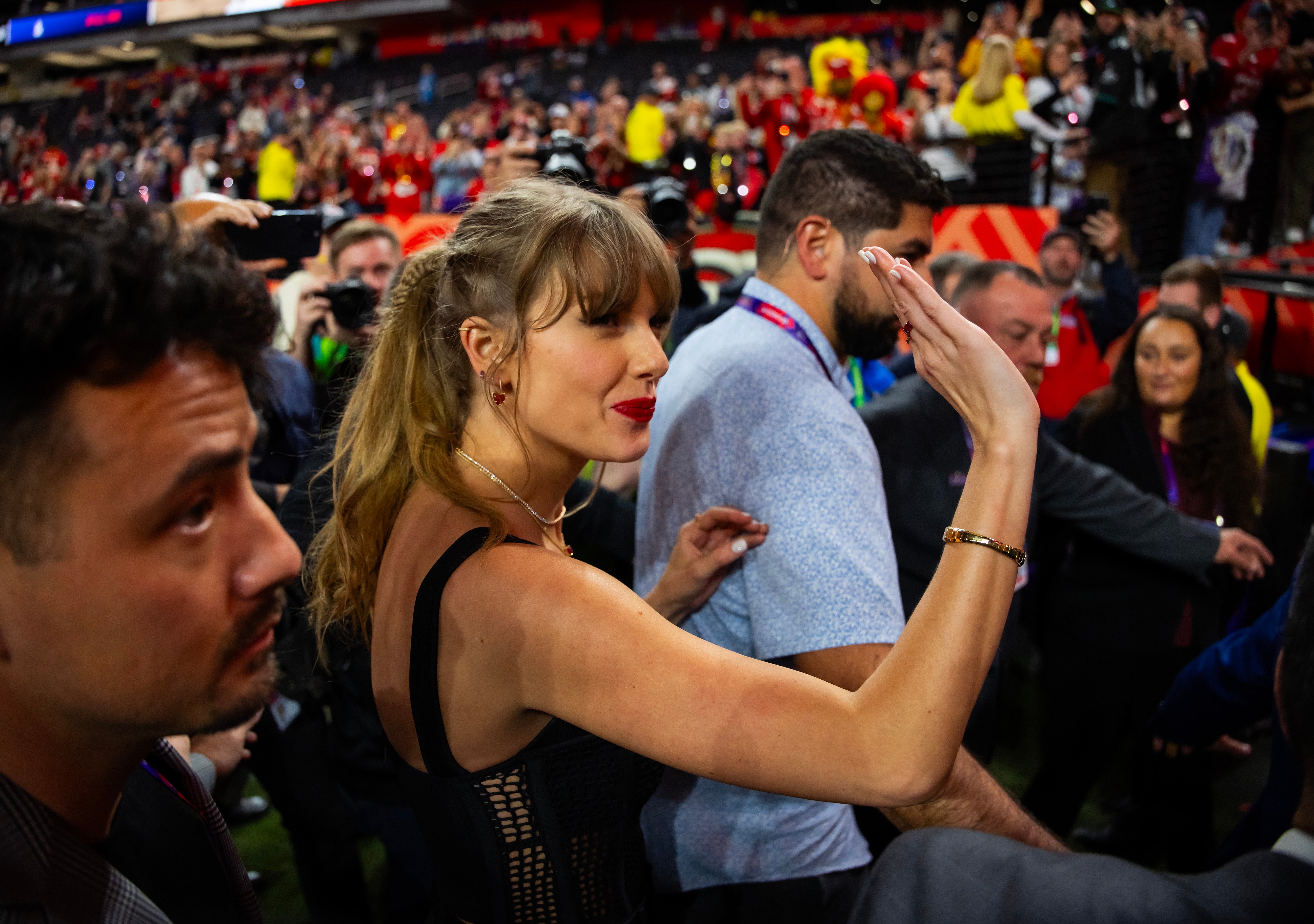 Feb 11, 2024; Paradise, Nevada, USA; Taylor Swift on the field after the Kansas City Chiefs defeated the San Francisco 49ers in Super Bowl LVIII at Allegiant Stadium