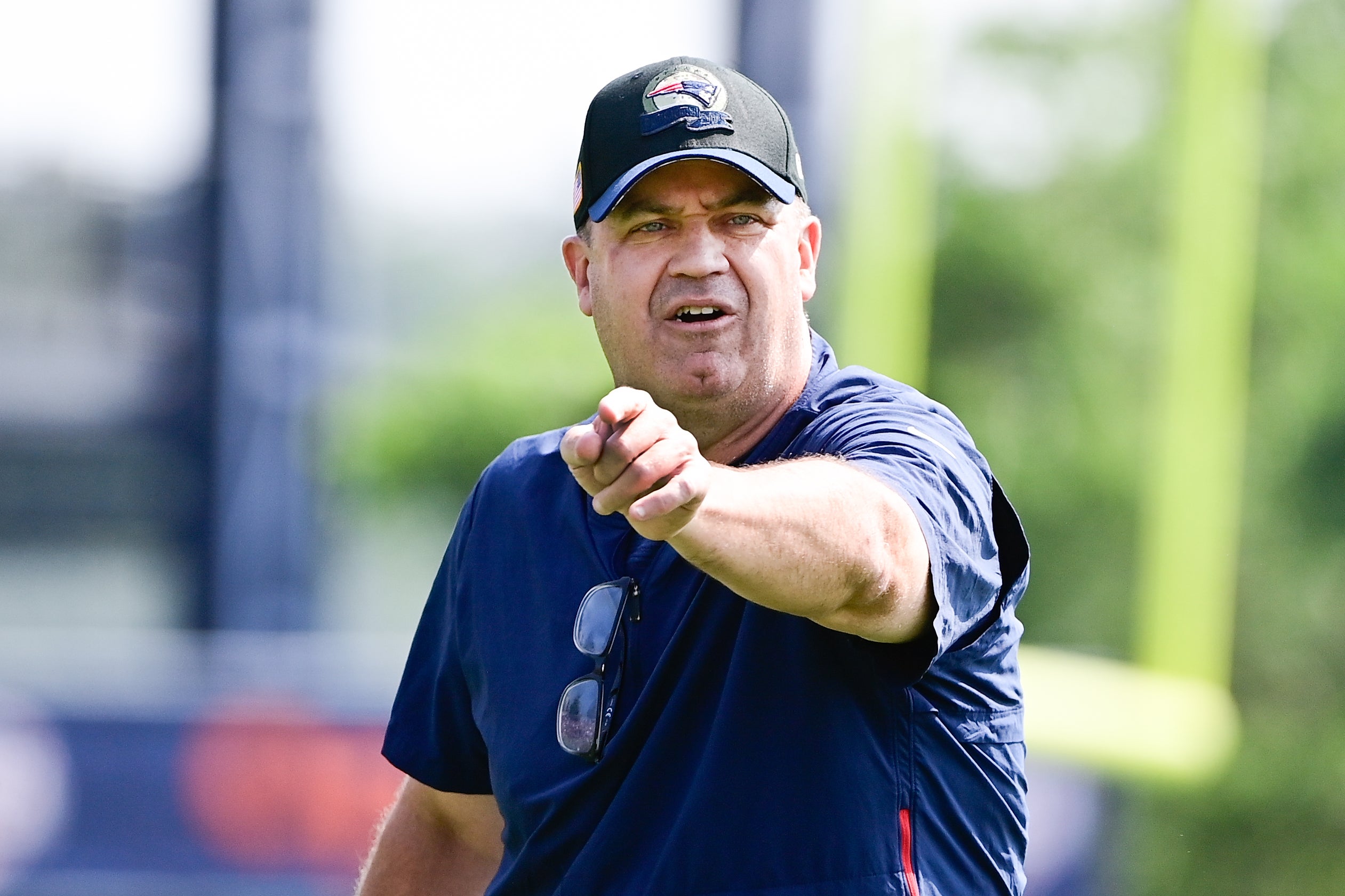 Jul 26, 2023; Foxborough, MA, USA; New England Patriots offensive coordinator/quarterbacks coach Bill O'Brien directs the office on a drill during training camp at Gillette Stadium.