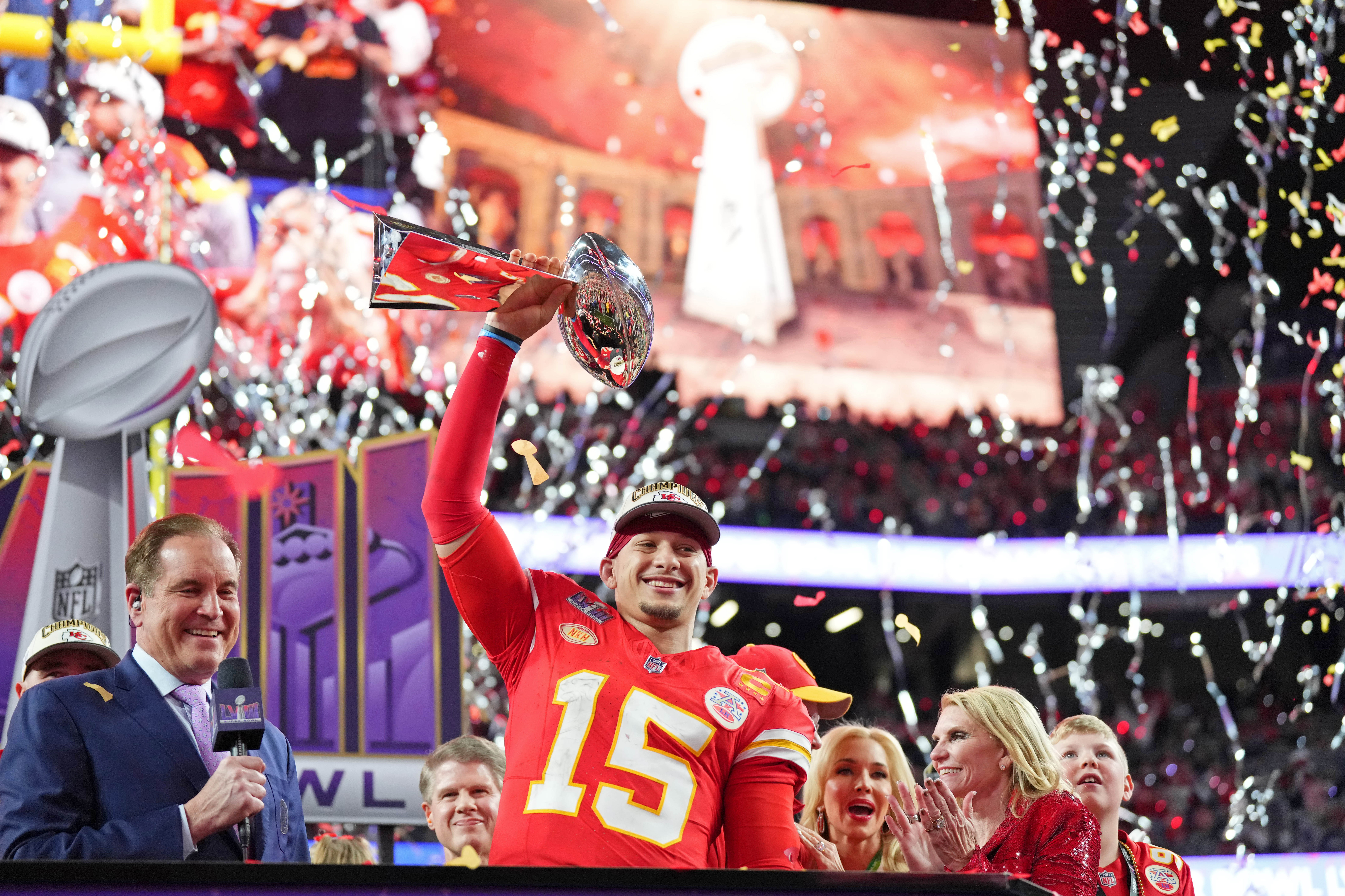 Feb 11, 2024; Paradise, Nevada, USA; Kansas City Chiefs quarterback Patrick Mahomes (15) holds the Vince Lombardi Trophy after winning Super Bowl LVIII against the San Francisco 49ers at Allegiant Stadium.