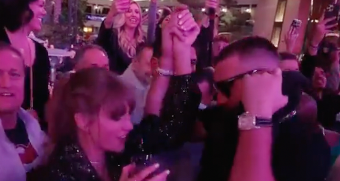 Taylor Swift and Travis Kelce dance together at the Chiefs' Super Bowl afterparty