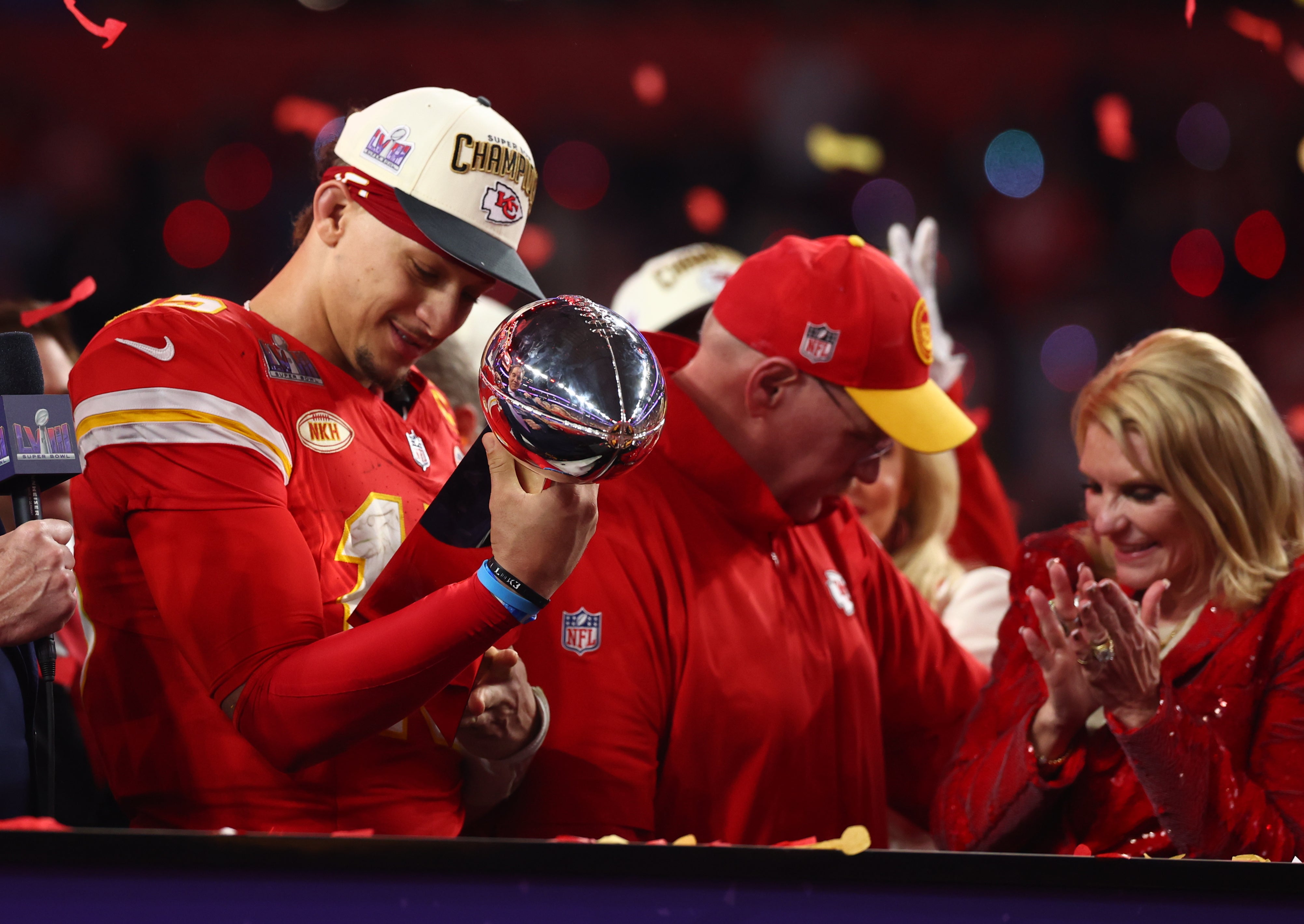Kansas City Chiefs quarterback Patrick Mahomes (15) celebrates with the Vince Lombardi Trophy after defeating the San Francisco 49ers in Super Bowl LVIII at Allegiant Stadium.
