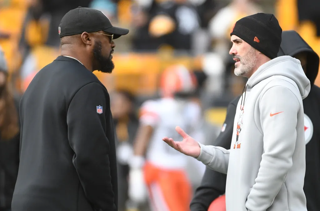 Pittsburgh Steelers head coach Mike Tomlin (left) meets with Cleveland Browns head coach Kevin Stefanski before their game at Acrisure Stadium.