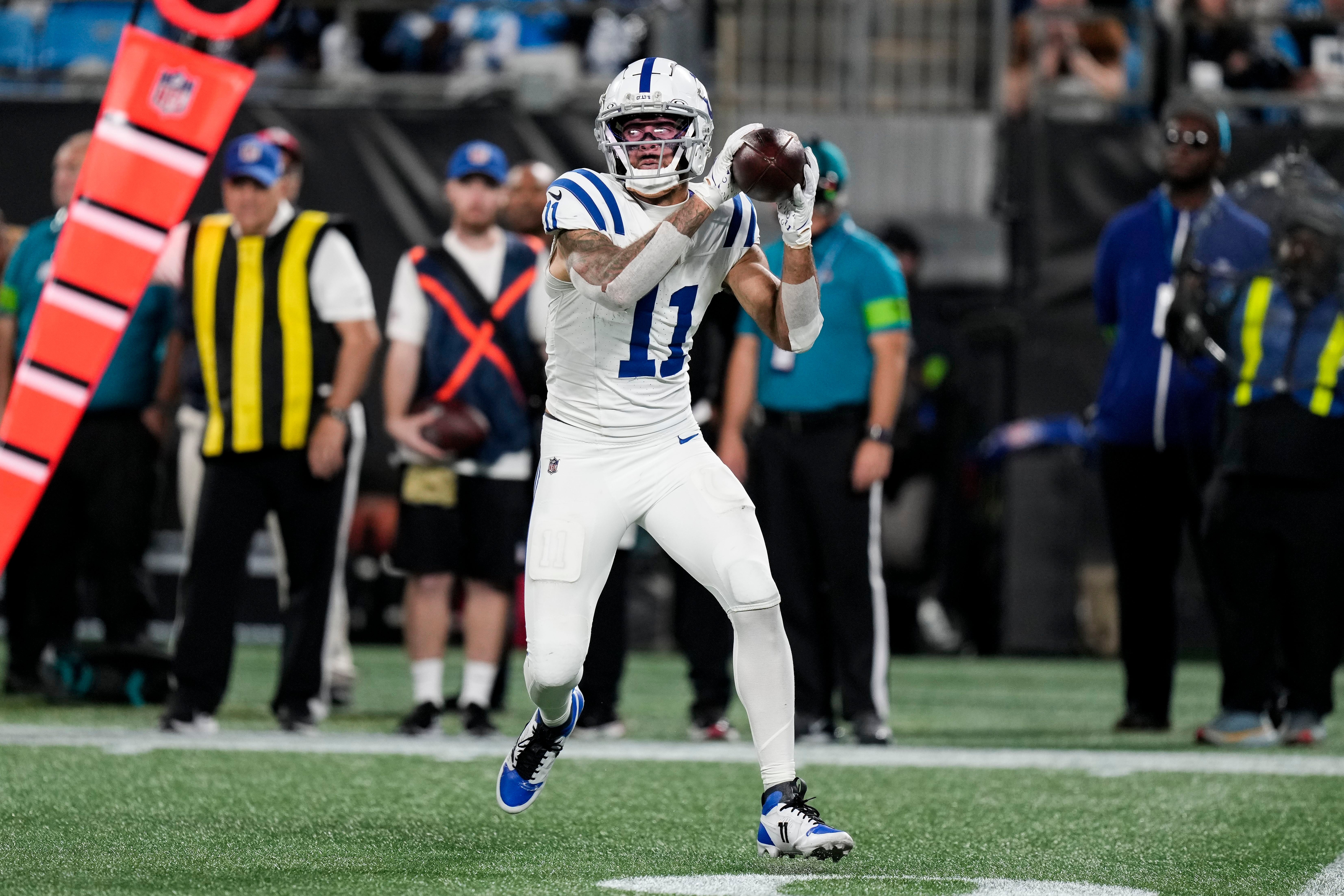 Nov 5, 2023; Charlotte, North Carolina, USA; Indianapolis Colts wide receiver Michael Pittman Jr. (11) makes a catch during the second half against the Carolina Panthers at Bank of America Stadium.