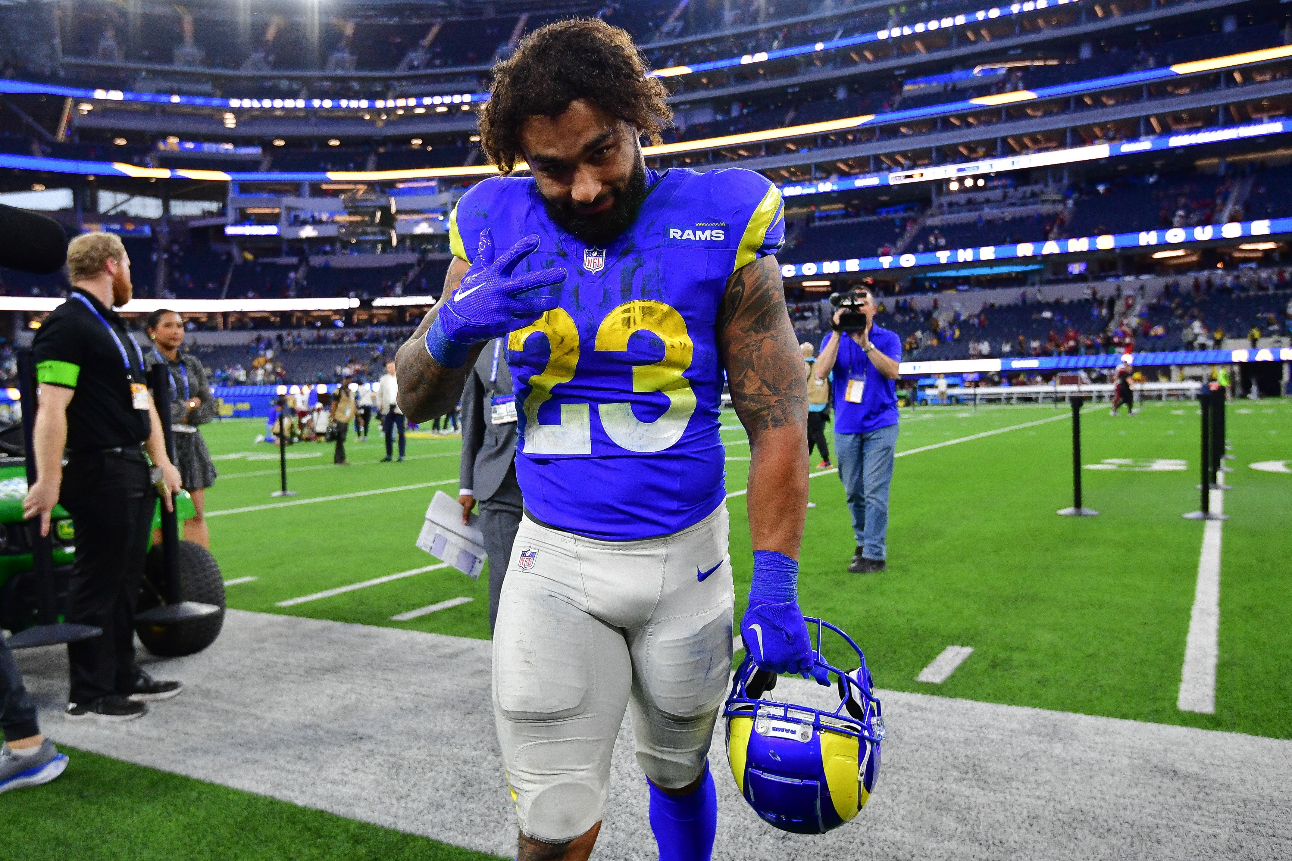 Dec 17, 2023; Inglewood, California, USA; Los Angeles Rams running back Kyren Williams (23) following the victory against the Washington Commanders at SoFi Stadium. Mandatory Credit: Gary A. Vasquez-USA TODAY Sports