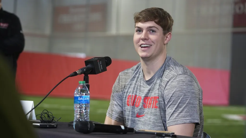 Ohio State University football quarterback transfer Will Howard talks with the Columbus media during his first sit-down interview since transferring