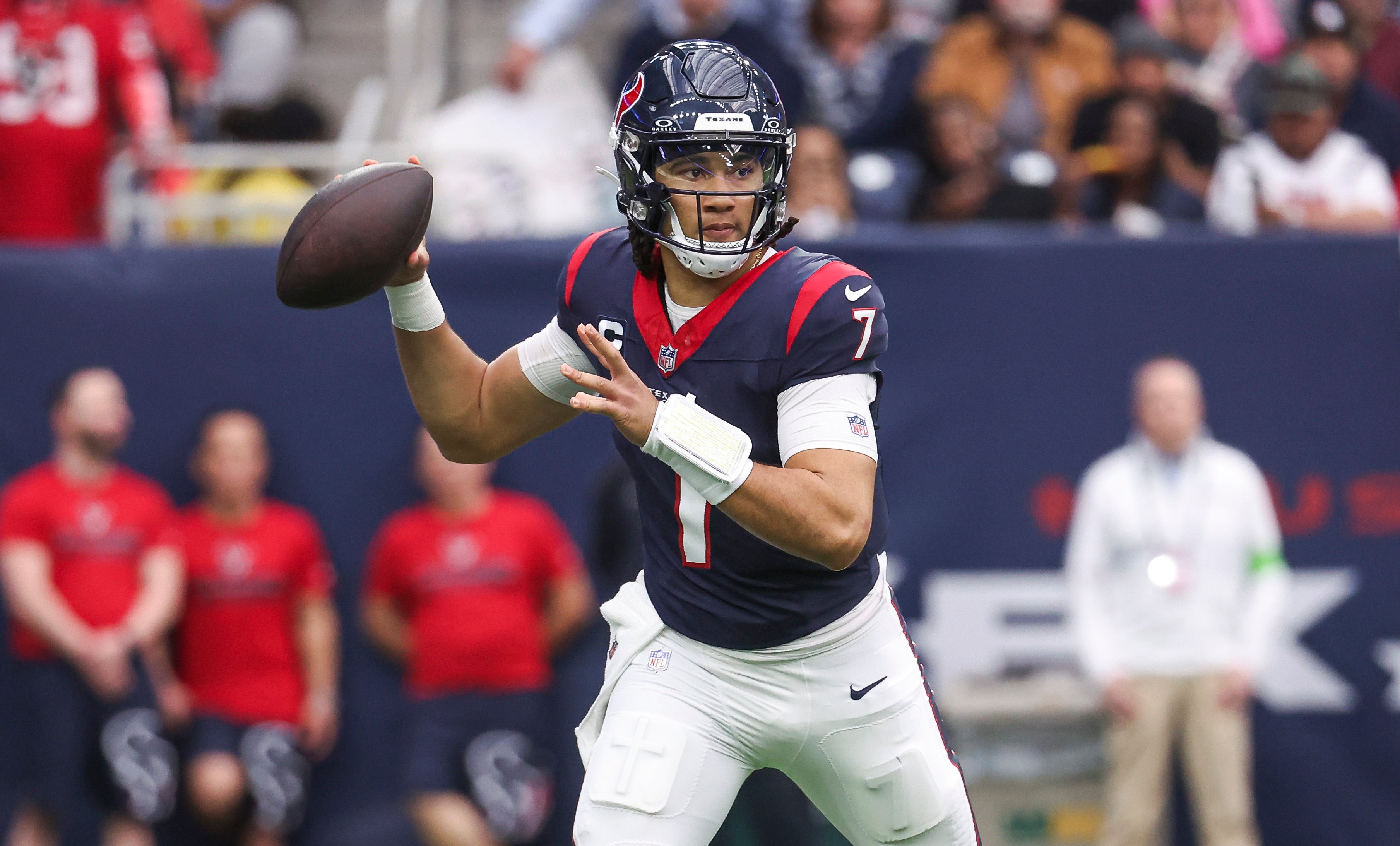 Dec 31, 2023; Houston, Texas, USA; Houston Texans quarterback C.J. Stroud (7) attempts a pass during the third quarter against the Tennessee Titans at NRG Stadium.