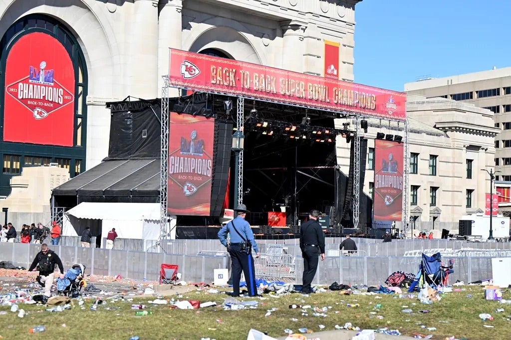 Police clear the area after shots were fired after the celebration of the Kansas City Chiefs winning Super Bowl LVIII.