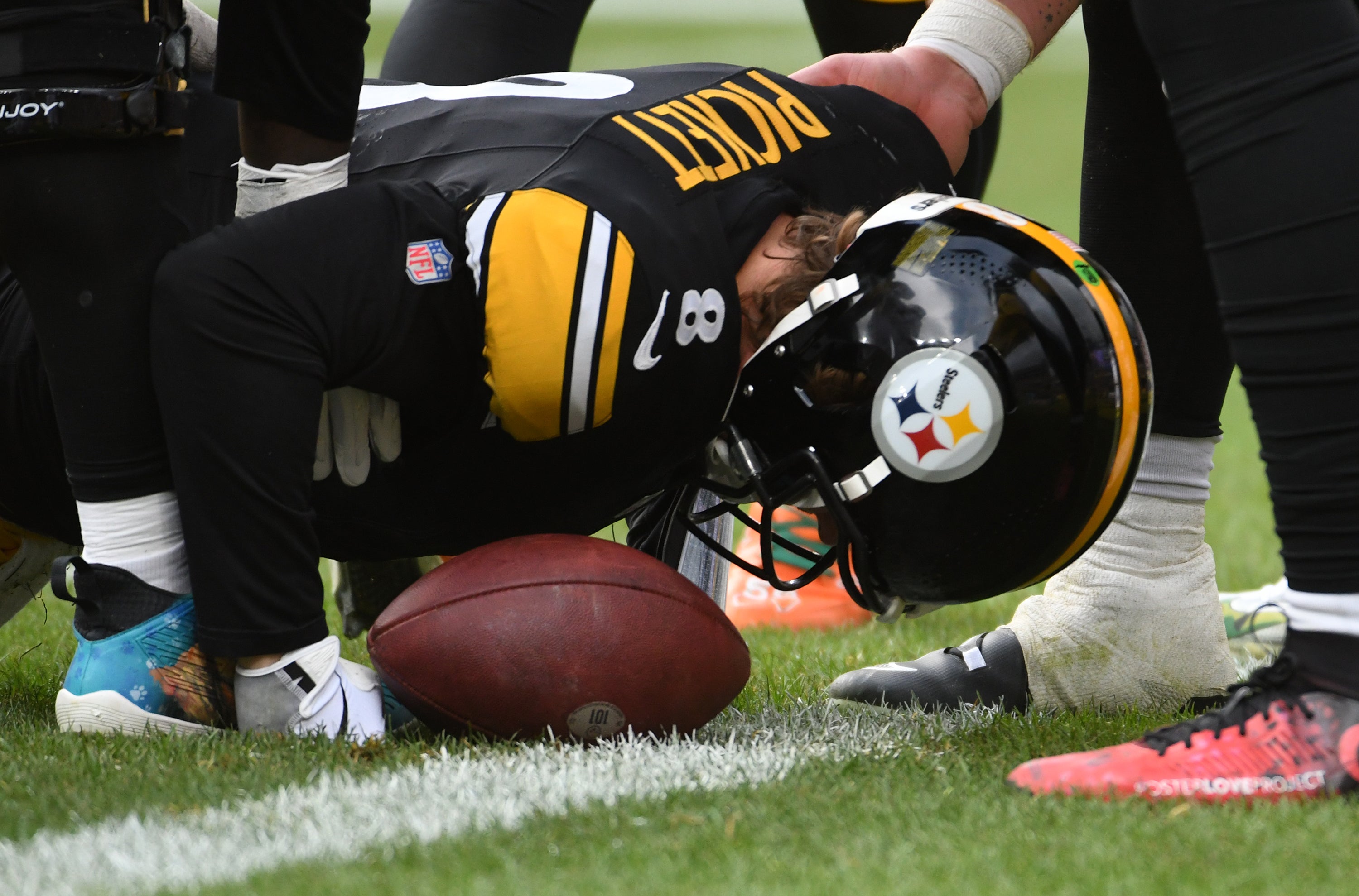 Dec 3, 2023; Pittsburgh, Pennsylvania, USA; Pittsburgh Steelers quarterback Kenny Pickett (8) is stopped by Arizona Cardinals defensive lineman Jonathan Ledbetter (93) and linebacker Josh Woods (10) during the second quarter at Acrisure Stadium. Pickett left the game with an injury. Mandatory Credit: Philip G. Pavely-USA TODAY Sports  