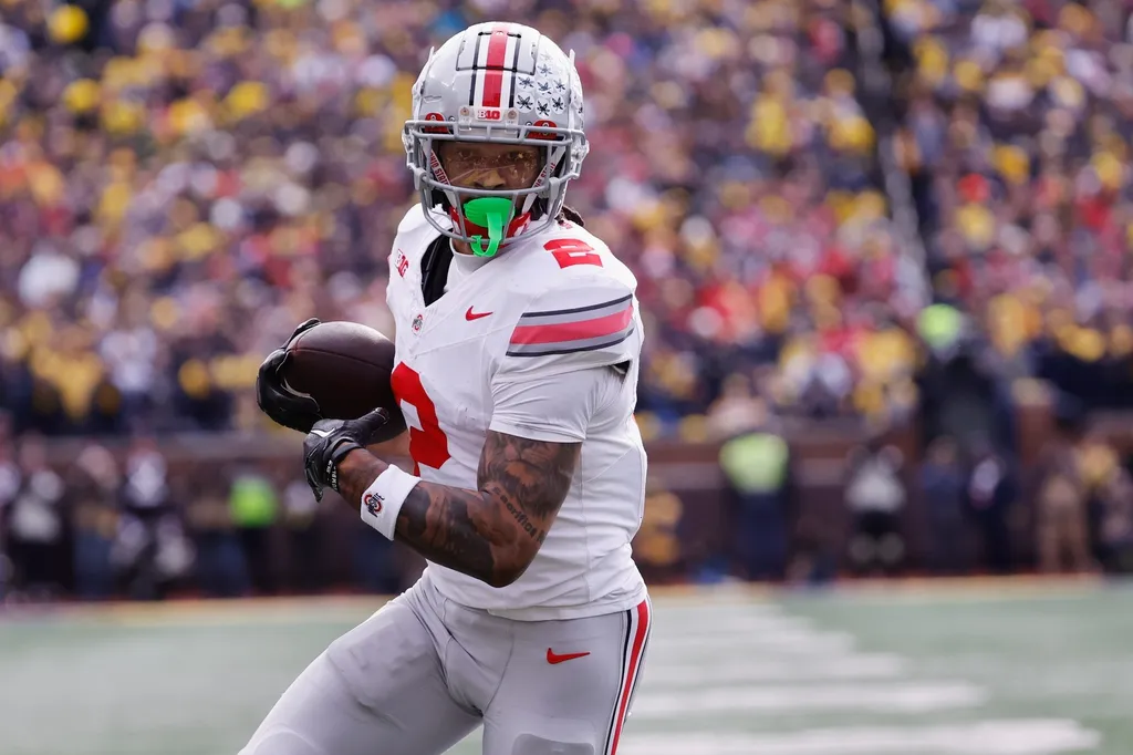 Ohio State Buckeyes wide receiver Emeka Egbuka (2) makes a reception for a touchdown in the first half against the Michigan Wolverines at Michigan Stadium.
