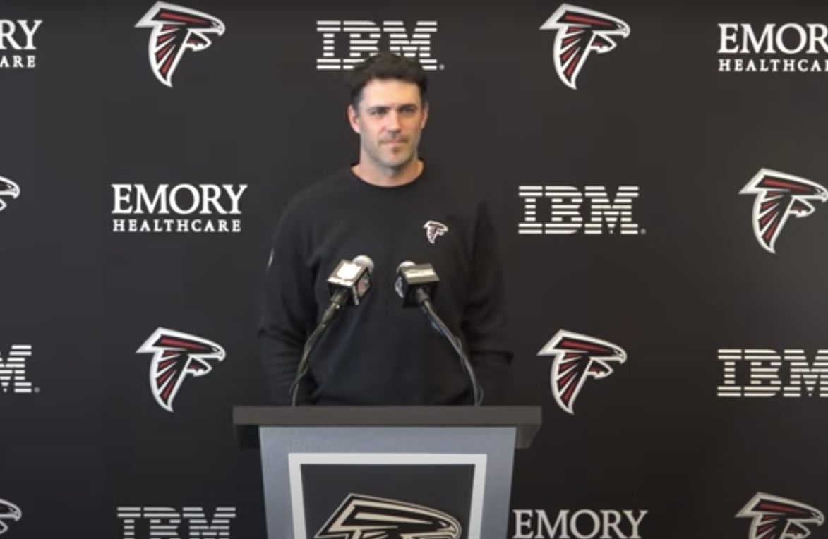 Falcons offensive coordinator Zac Robinson speaks to reporters during his introductory press conference.