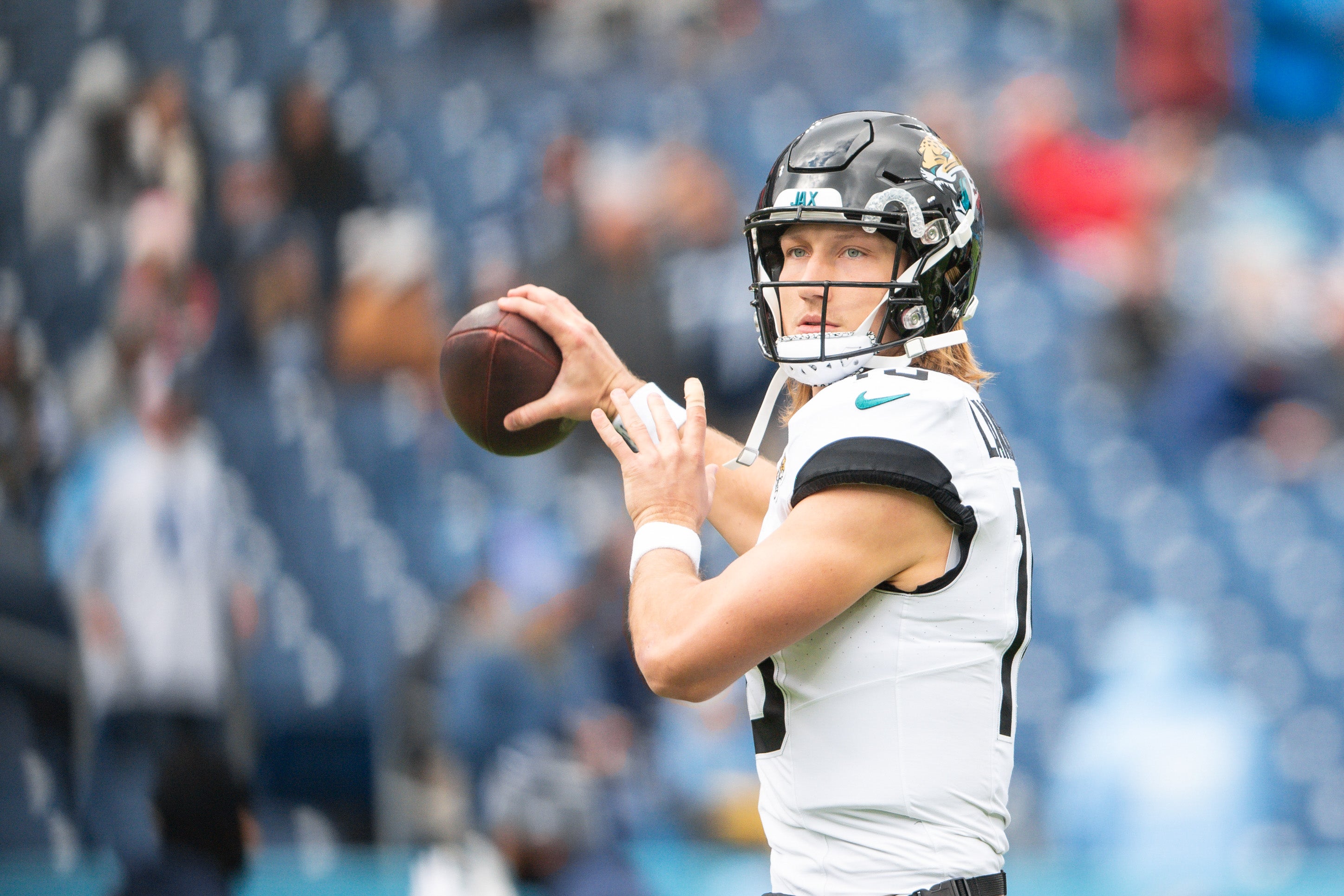 Jan 7, 2024; Nashville, Tennessee, USA; Jacksonville Jaguars quarterback Trevor Lawrence (16) throws during pre-game warmups against the Tennessee Titans at Nissan Stadium.