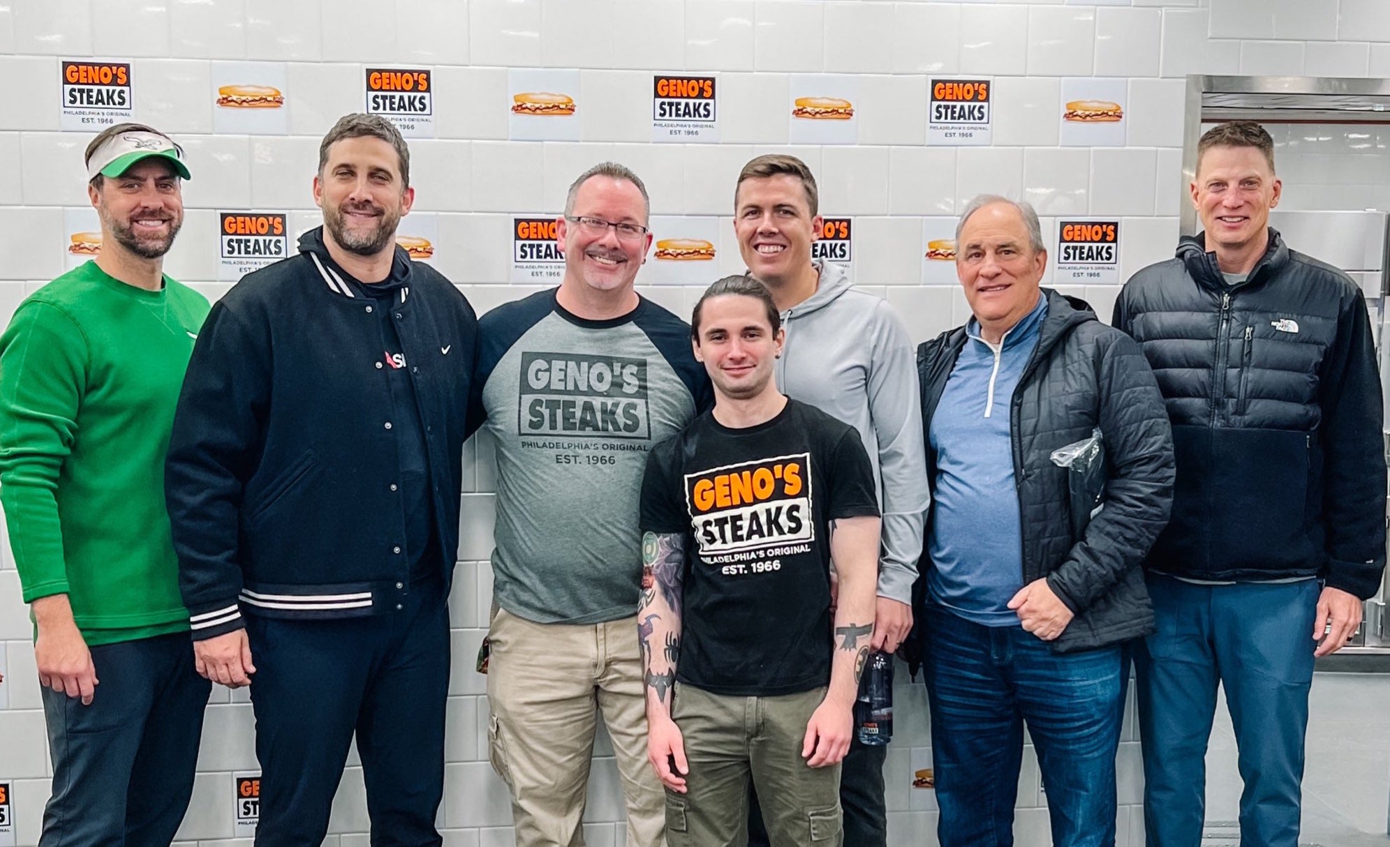 Philadelphia Eagles head coach Nick Sirianni treats his new coaching staff to Geno's cheesesteaks.