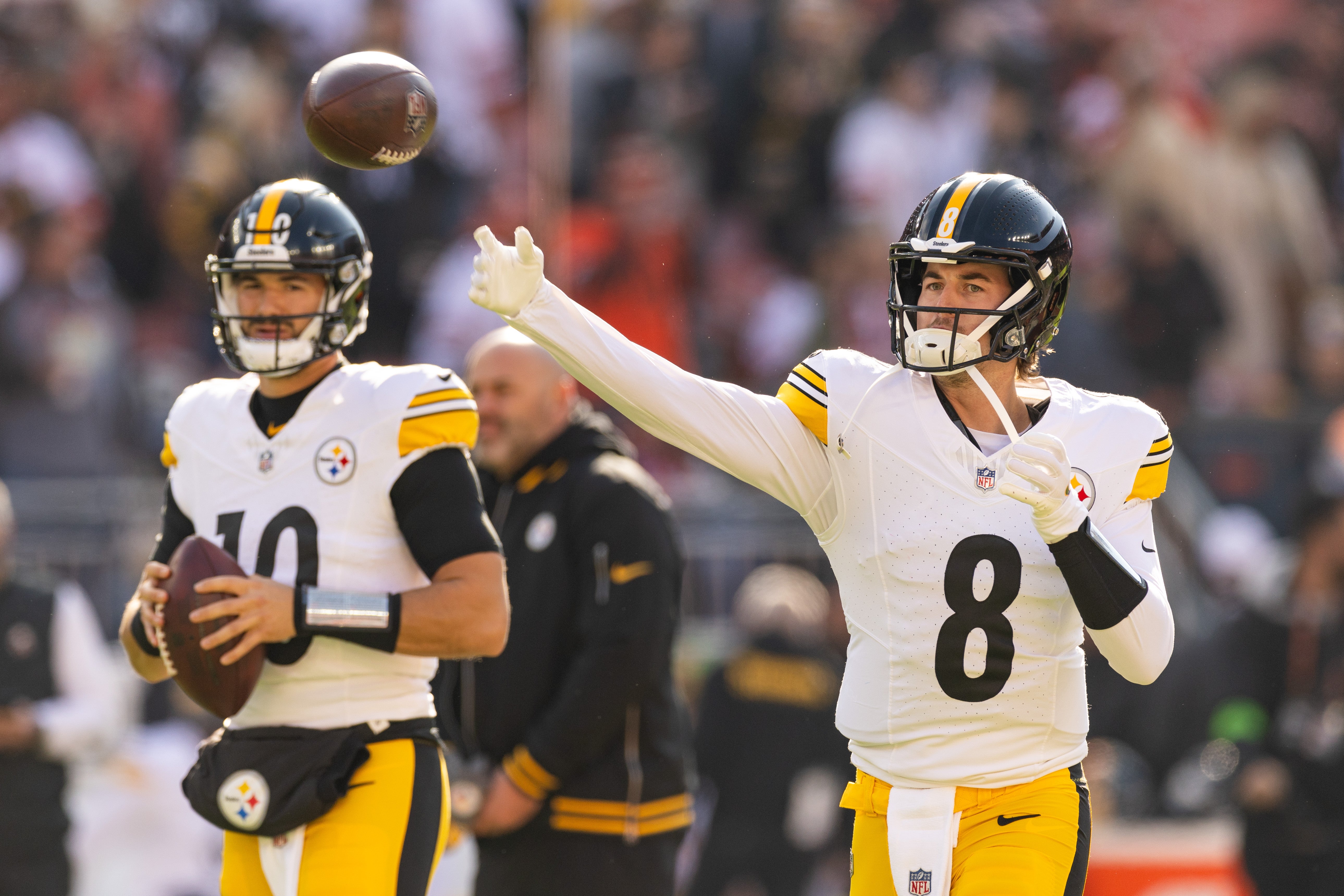 Nov 19, 2023; Cleveland, Ohio, USA; Pittsburgh Steelers quarterback Kenny Pickett (8) throws the ball while quarterback Mitch Trubisky (10) watches during warm ups before the game against the Cleveland Browns at Cleveland Browns Stadium. Mandatory Credit: Scott Galvin-USA TODAY Sports