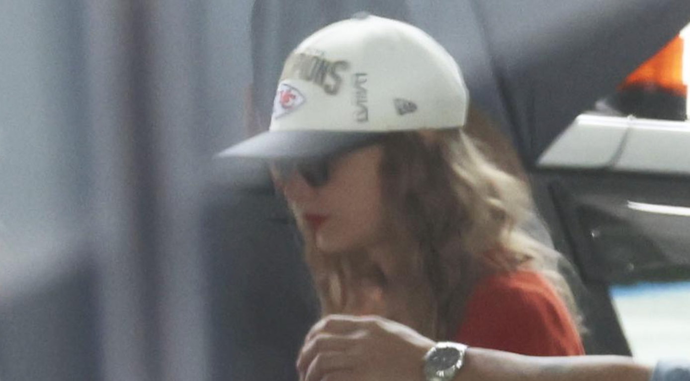 Taylor Swift in Chiefs Super Bowl championship hat during Eras Tour