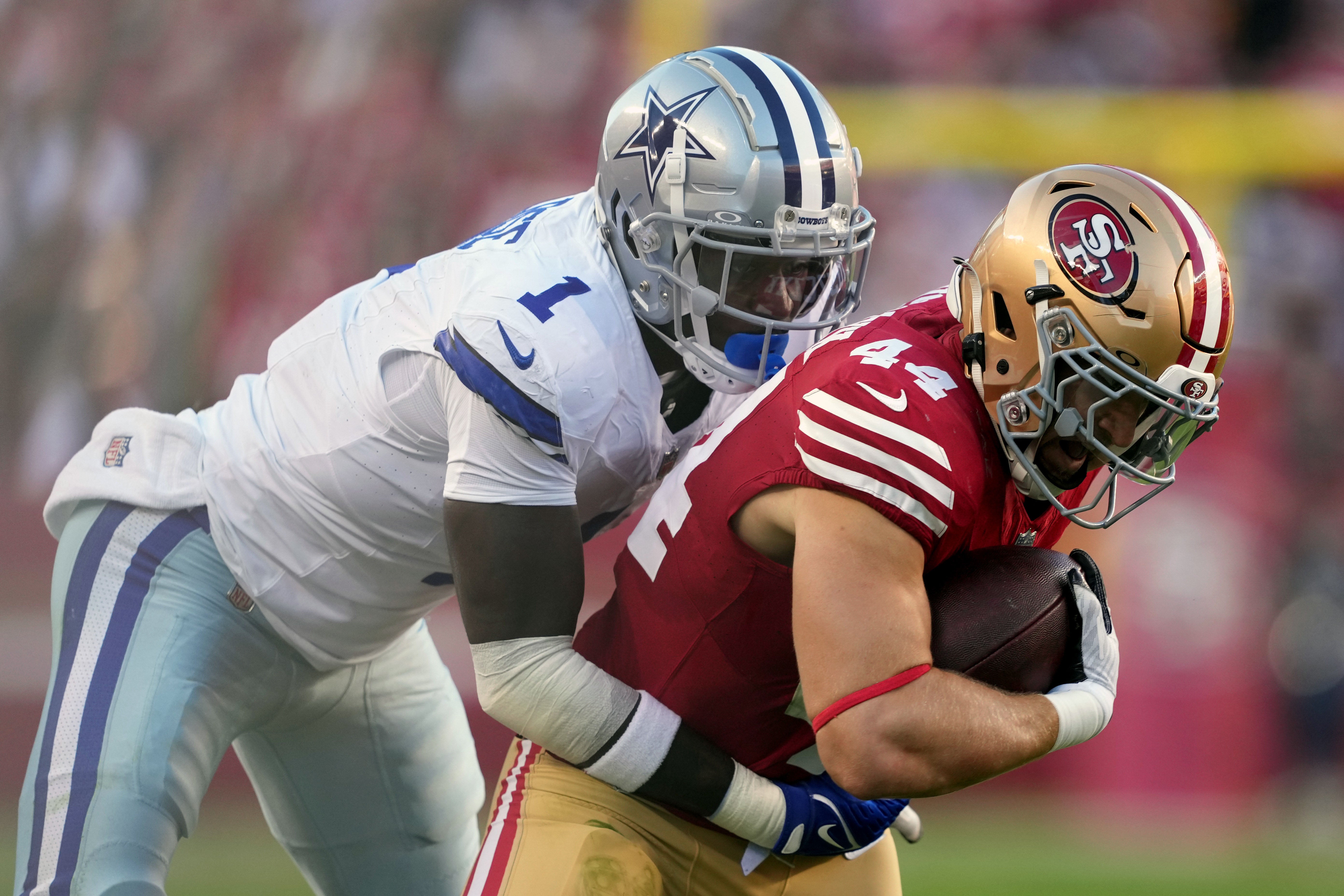 Dallas Cowboys safety Jayron Kearse (1) tackles San Francisco 49ers fullback Kyle Juszczyk (44) during the first quarter at Levi's Stadium.