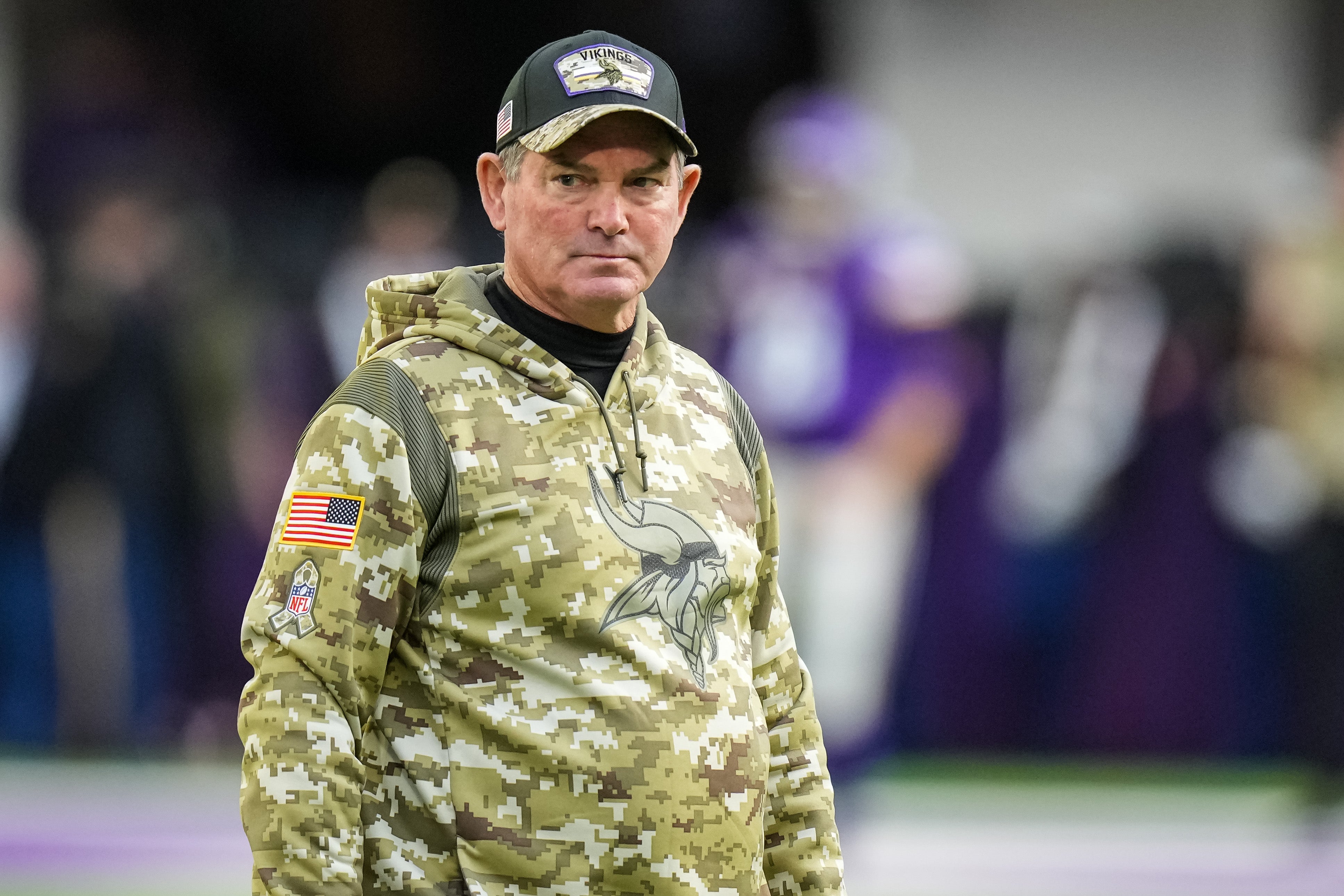 Minneapolis, Minnesota, USA; Minnesota Vikings head coach Mike Zimmer looks on prior to the game against the Green Bay Packers at U.S. Bank Stadium.