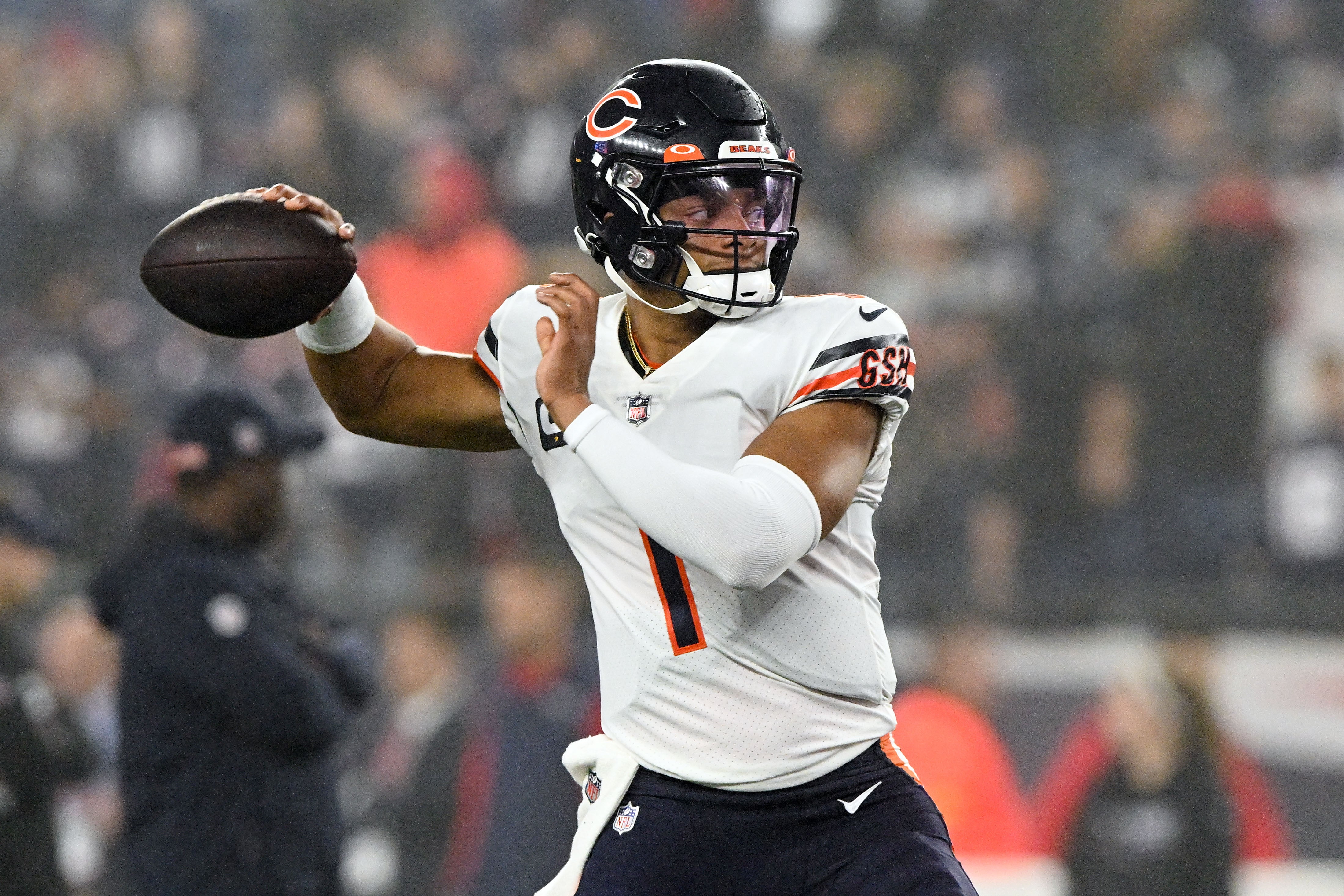 Oct 24, 2022; Foxborough, Massachusetts, USA; Chicago Bears quarterback Justin Fields (1) throws the ball during warmups before a game against the New England Patriots at Gillette Stadium.