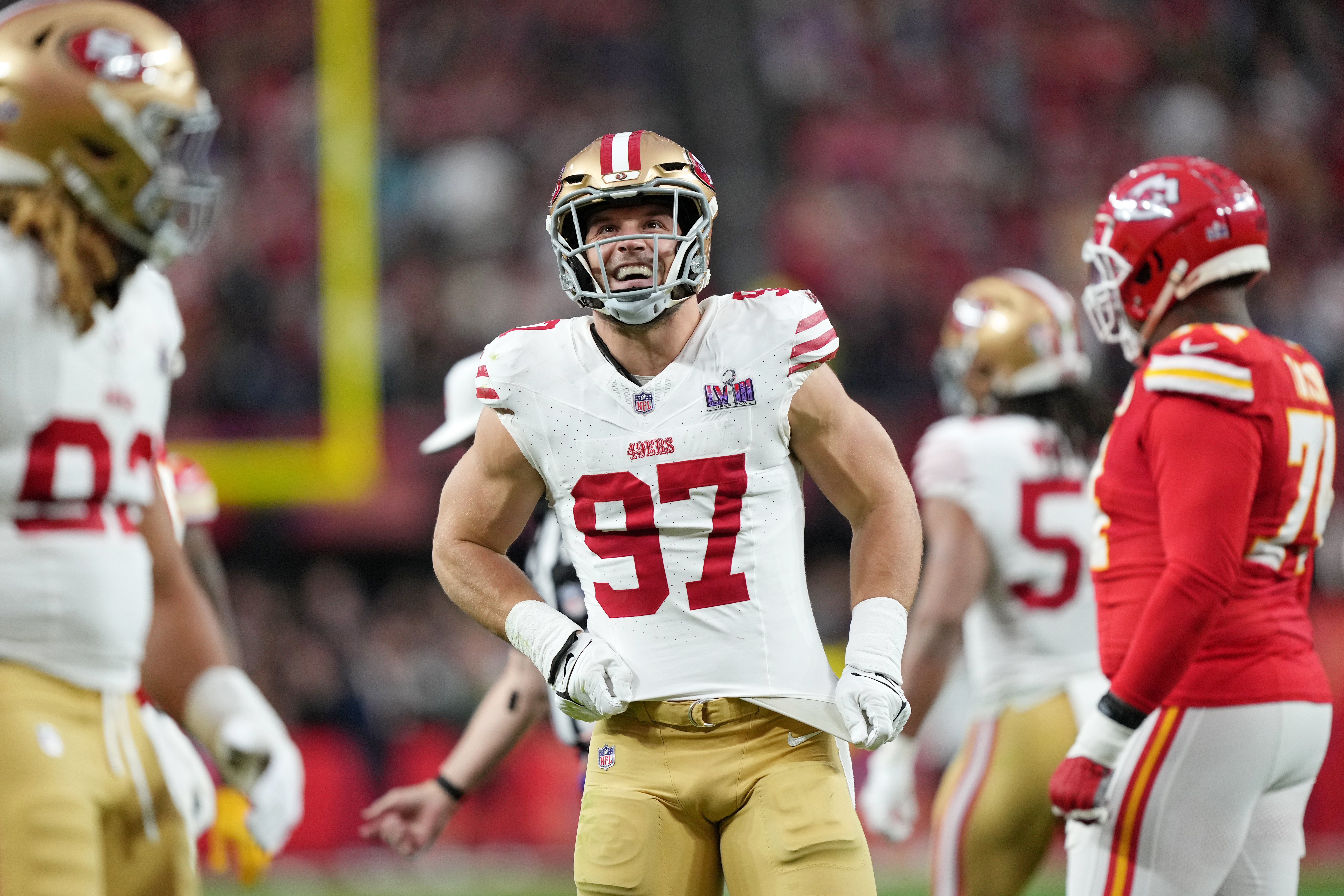 Feb 11, 2024; Paradise, Nevada, USA; San Francisco 49ers defensive end Nick Bosa (97) reacts after sacking Kansas City Chiefs quarterback Patrick Mahomes (not pictured) during the first quarter of Super Bowl LVIII at Allegiant Stadium.