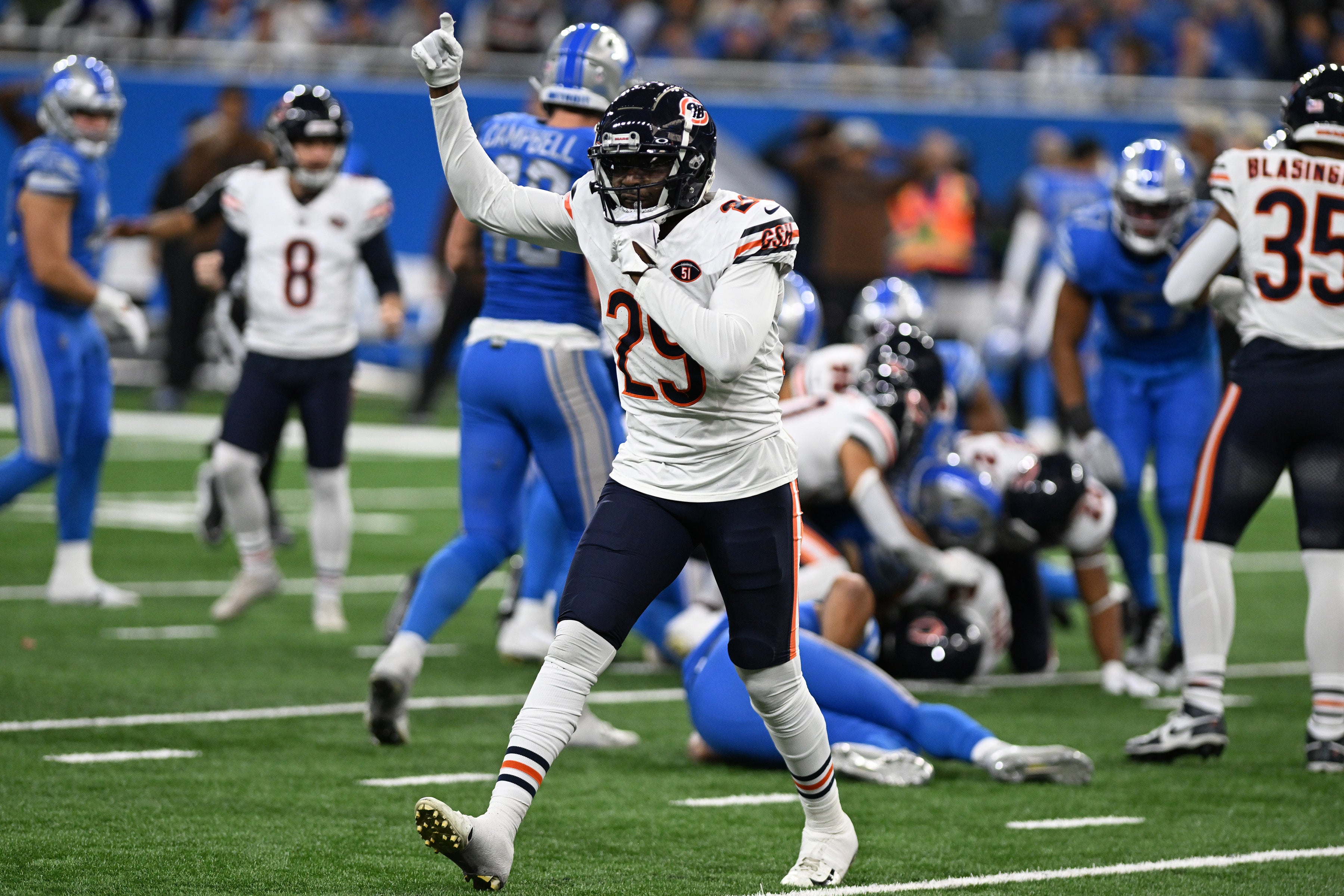Nov 19, 2023; Detroit, Michigan, USA; Chicago Bears cornerback Tyrique Stevenson (29) celebrates after a fumble recovery against the Detroit Lions in the third quarter at Ford Field.