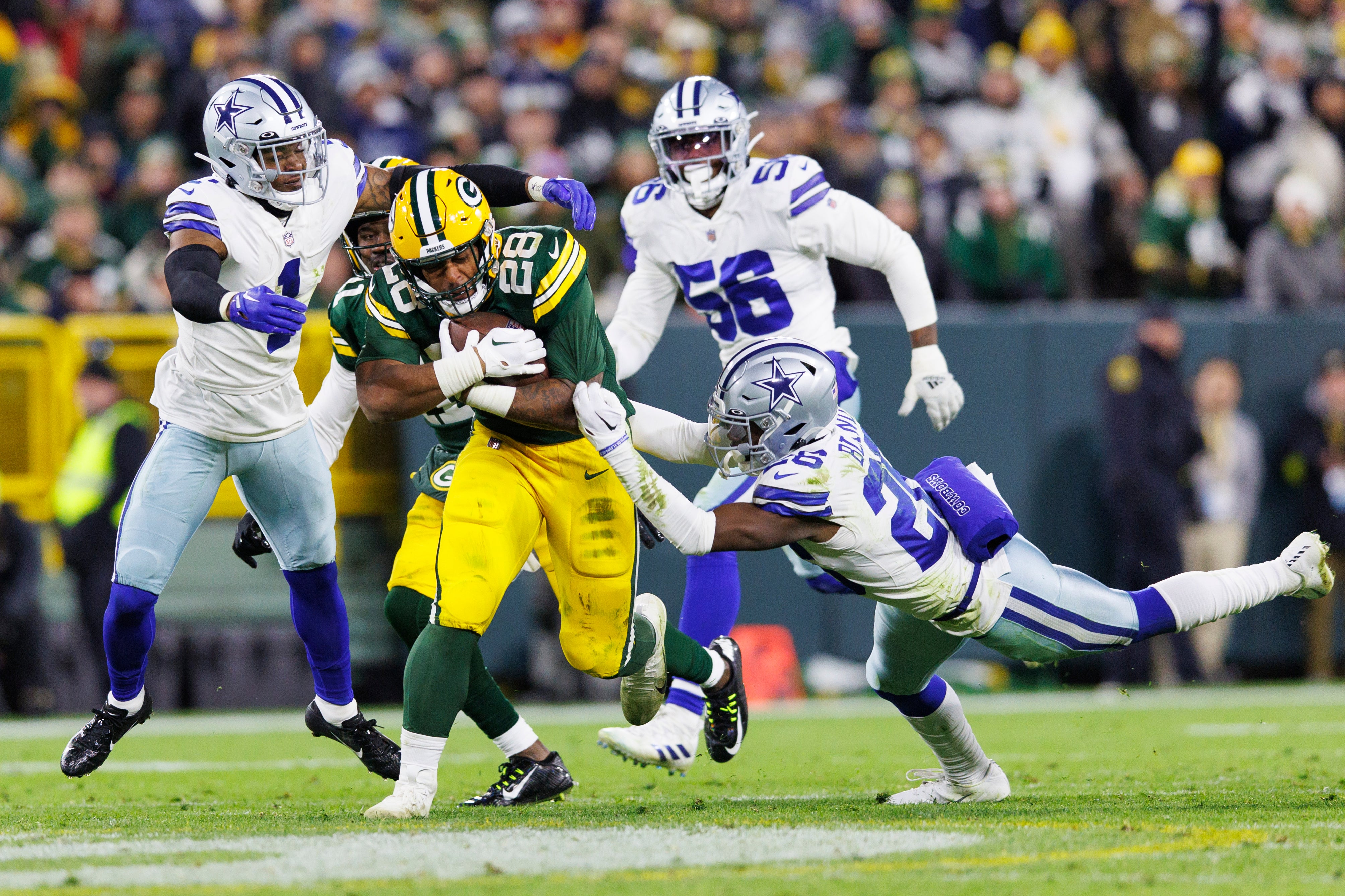 Green Bay Packers running back AJ Dillon (28) during the game against the Dallas Cowboys at Lambeau Field.