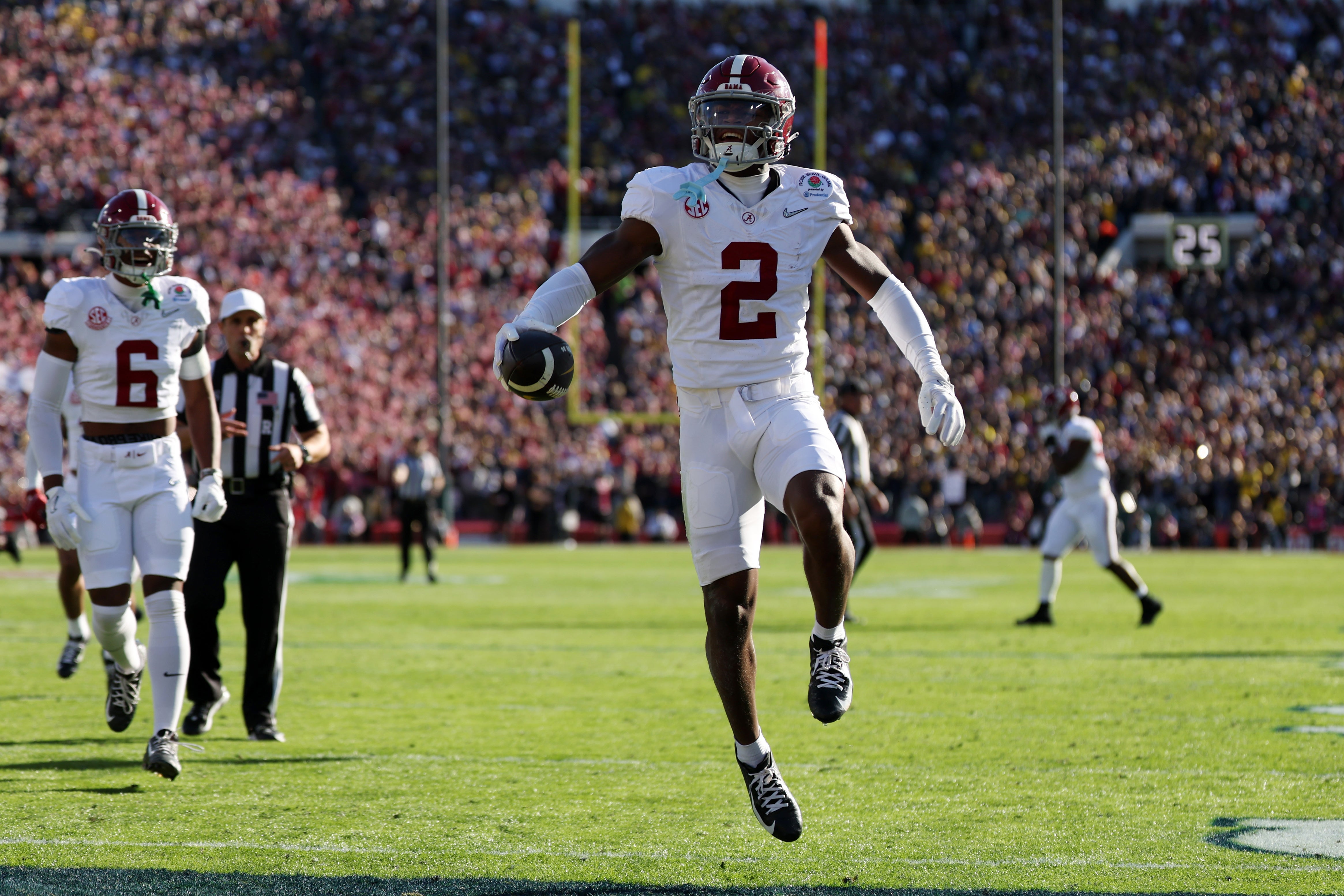 Jan 1, 2024; Pasadena, CA, USA; Alabama Crimson Tide defensive back Caleb Downs (2) celebrates after making a catch in the first quarter against the Michigan Wolverines in the 2024 Rose Bowl college football playoff semifinal game at Rose Bowl.