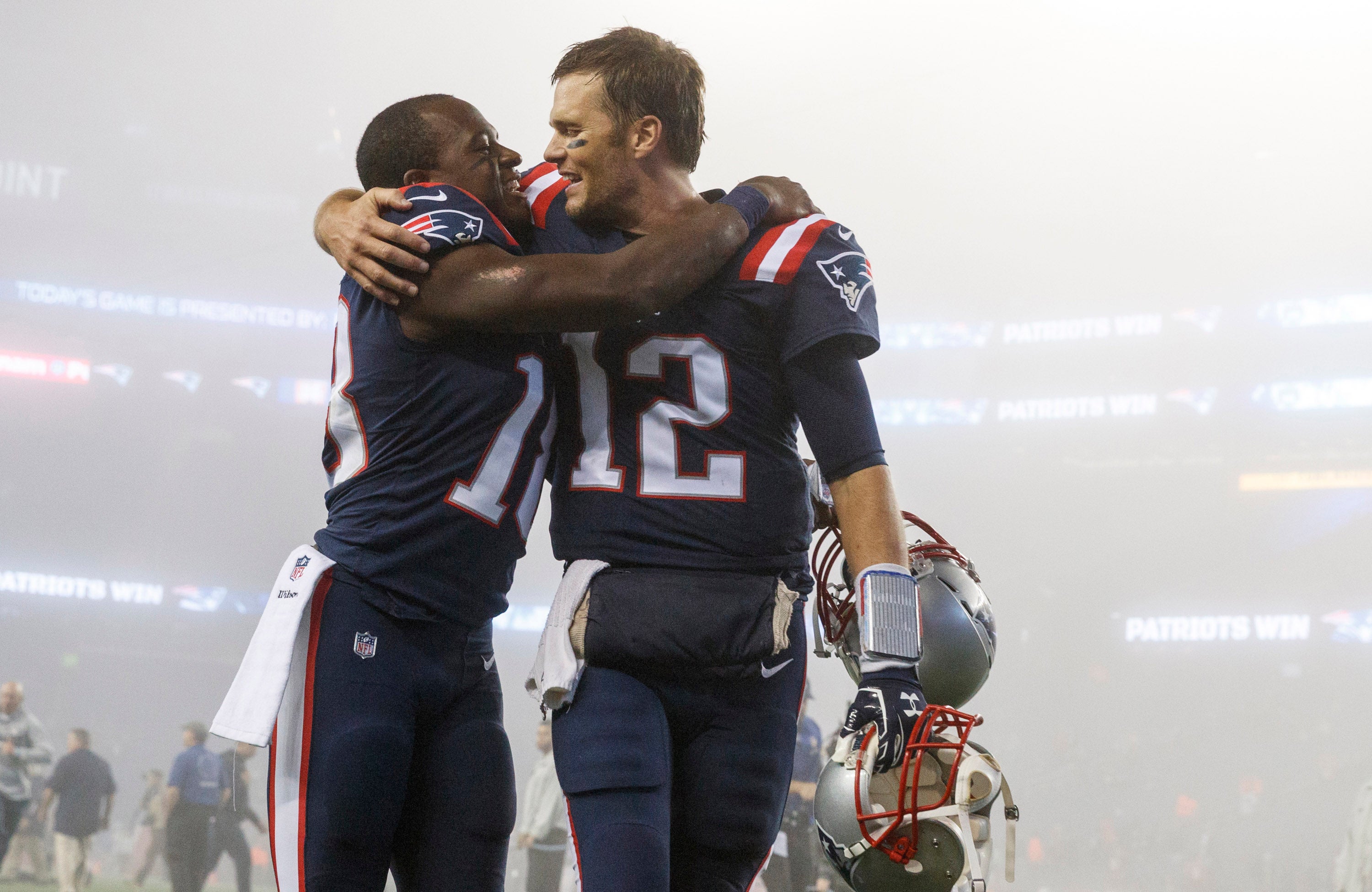Oct 22, 2017; Foxborough, MA, USA; New England Patriots quarterback Tom Brady (12) celebrates with wide receiver Matthew Slater (18) after defeating the Atlanta Falcons at Gillette Stadium