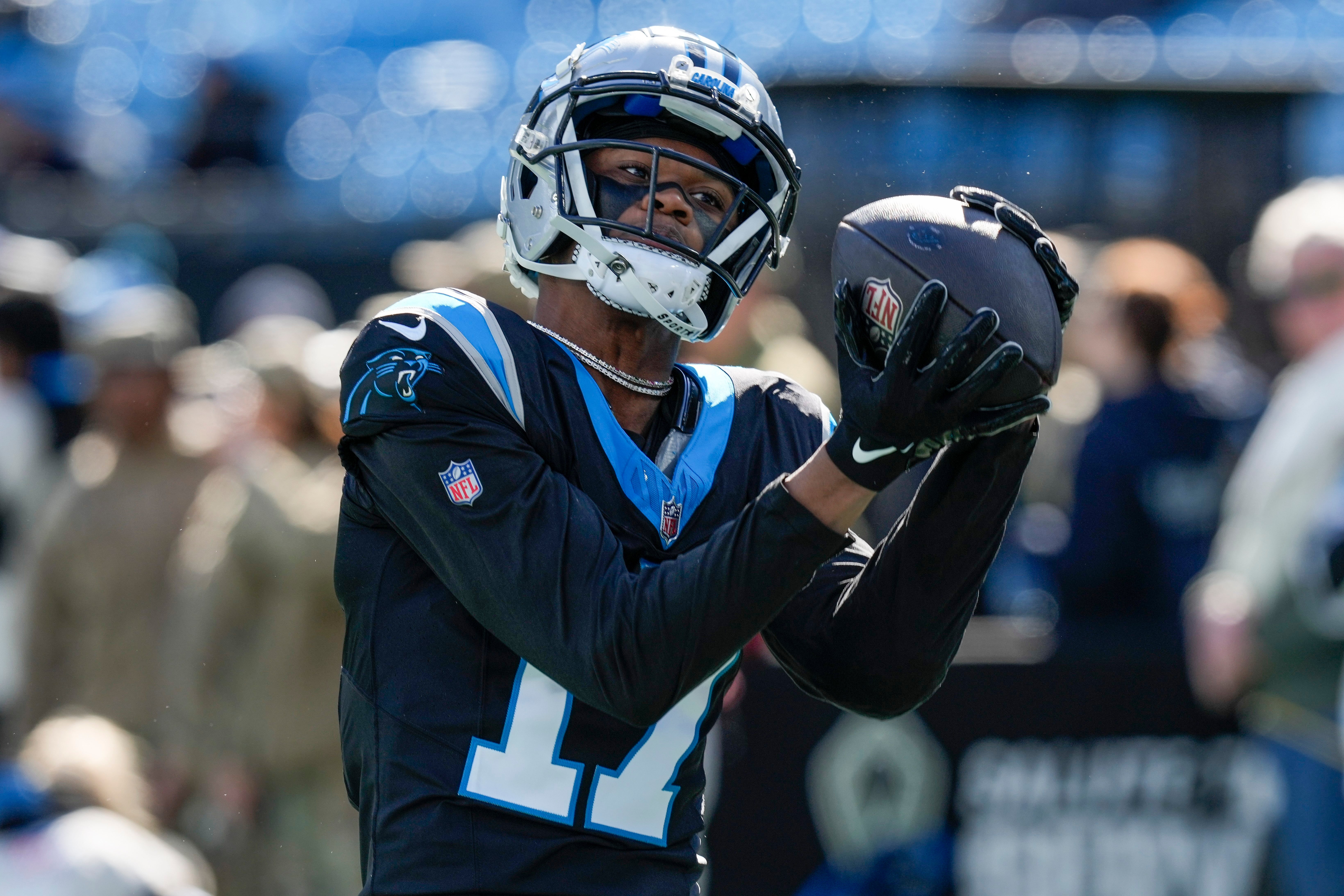 Jan 7, 2024; Charlotte, North Carolina, USA; Carolina Panthers wide receiver DJ Chark Jr. (17) makes a catch during pregame warm ups against the Tampa Bay Buccaneers at Bank of America Stadium. Mandatory Credit: Jim Dedmon-USA TODAY Sports