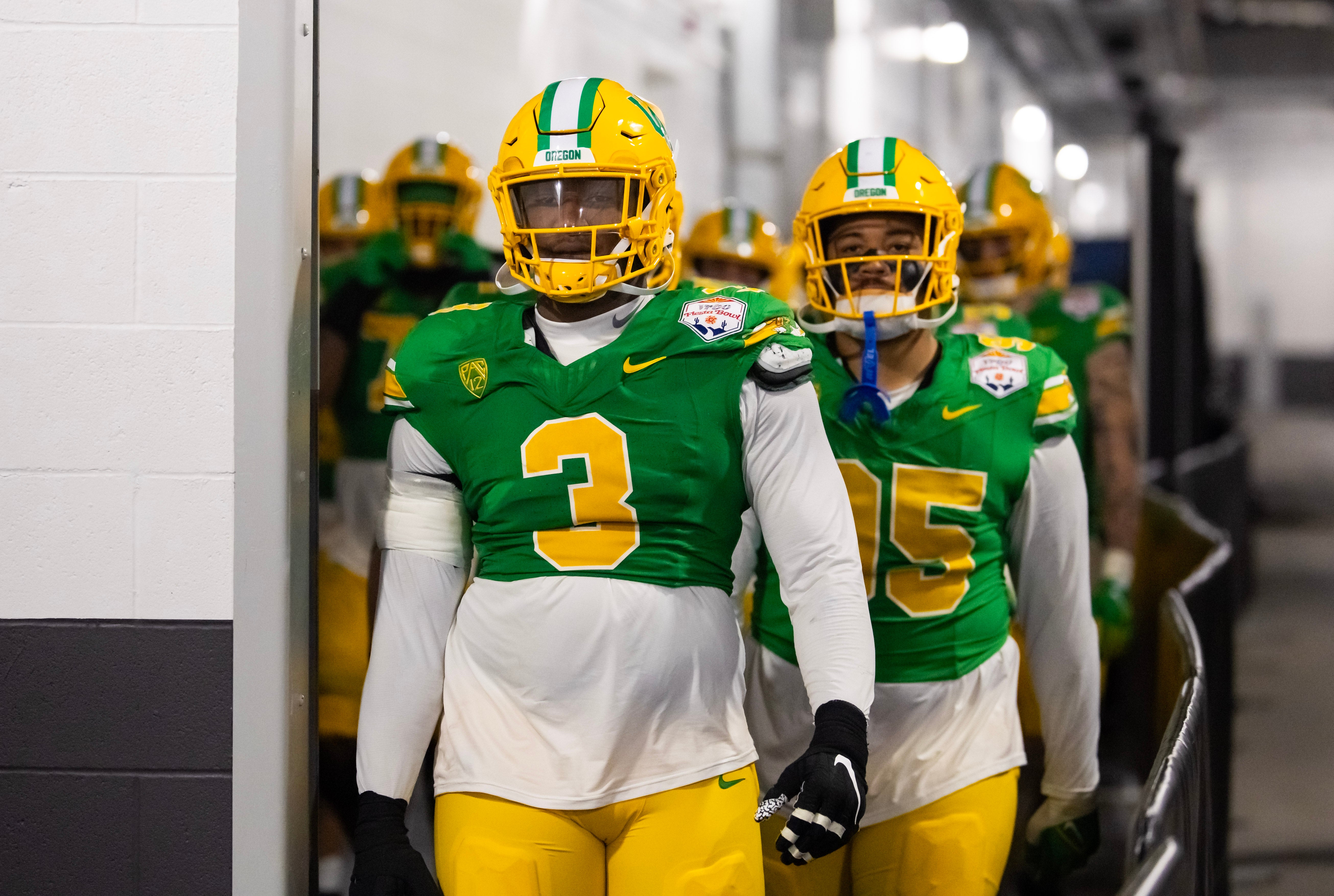 Jan 1, 2024; Glendale, AZ, USA; Oregon Ducks defensive end Brandon Dorlus (3) against the Liberty Flames during the 2024 Fiesta Bowl at State Farm Stadium. Mandatory Credit: Mark J. Rebilas-USA TODAY Sports